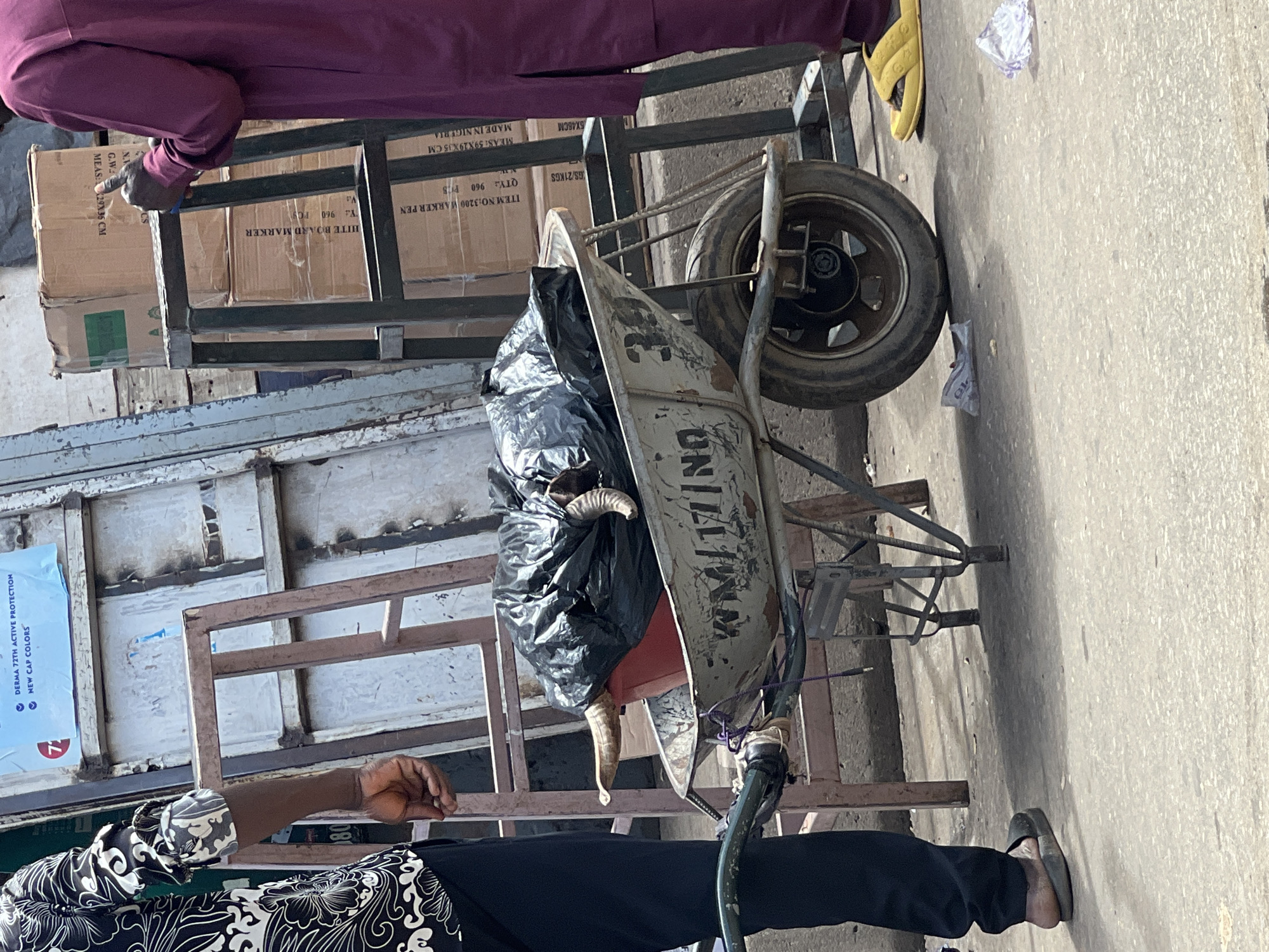 Morning street life documented across Abuja commercial districts
