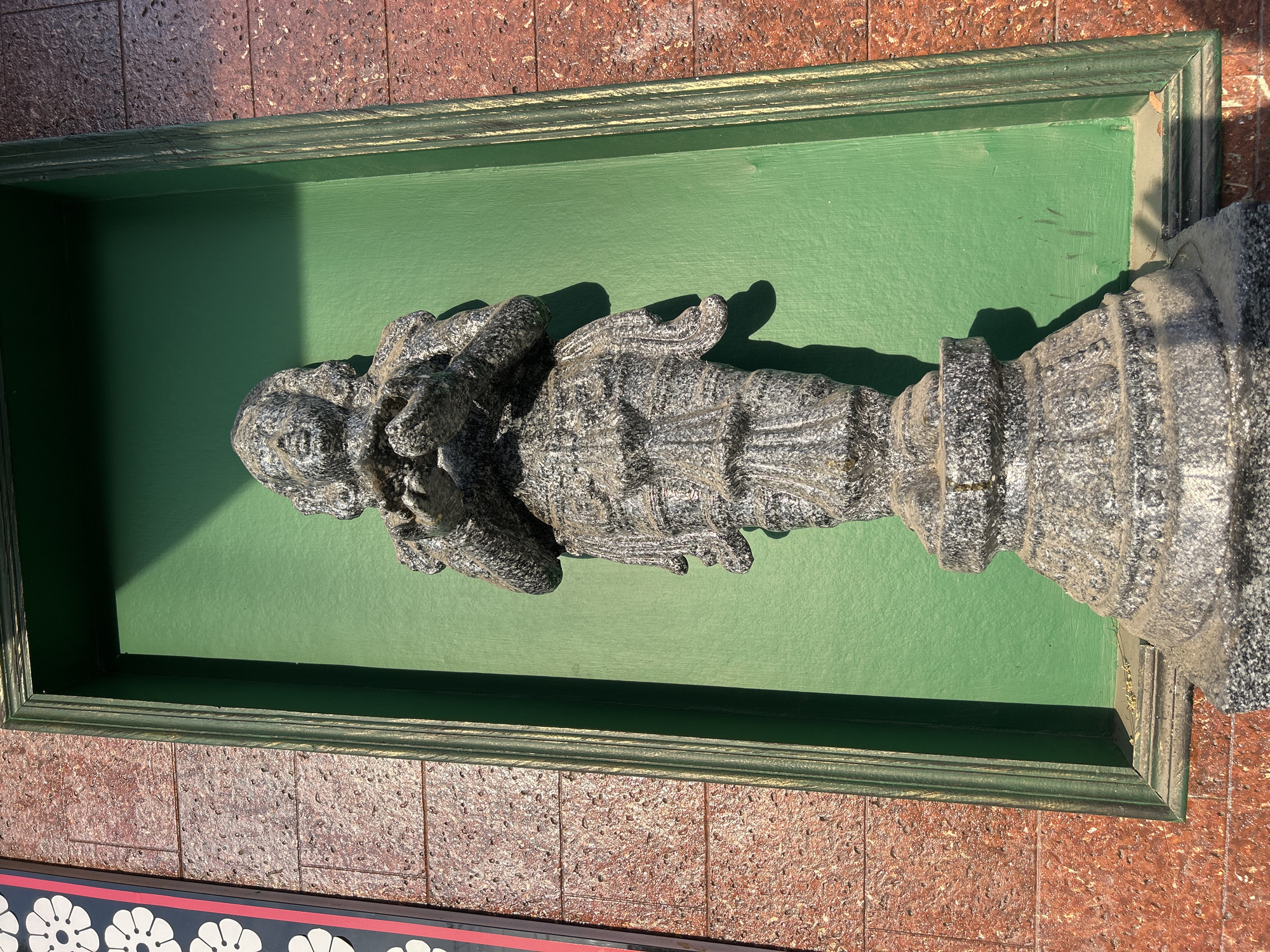 Religious sculptures and decorative archway documented in Puttaparthi