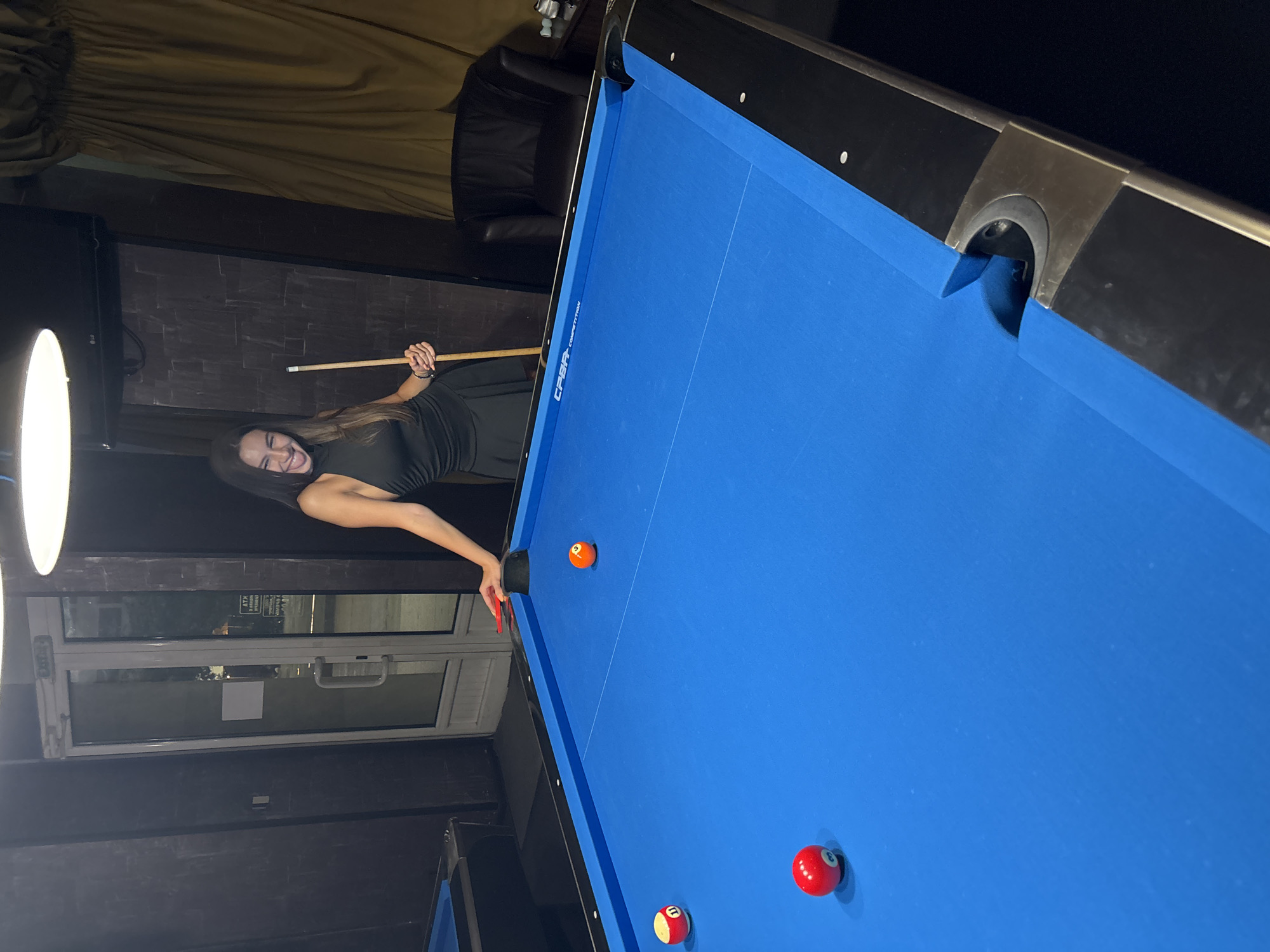 Pool night at a dimly lit bar in Vratsa, Bulgaria.