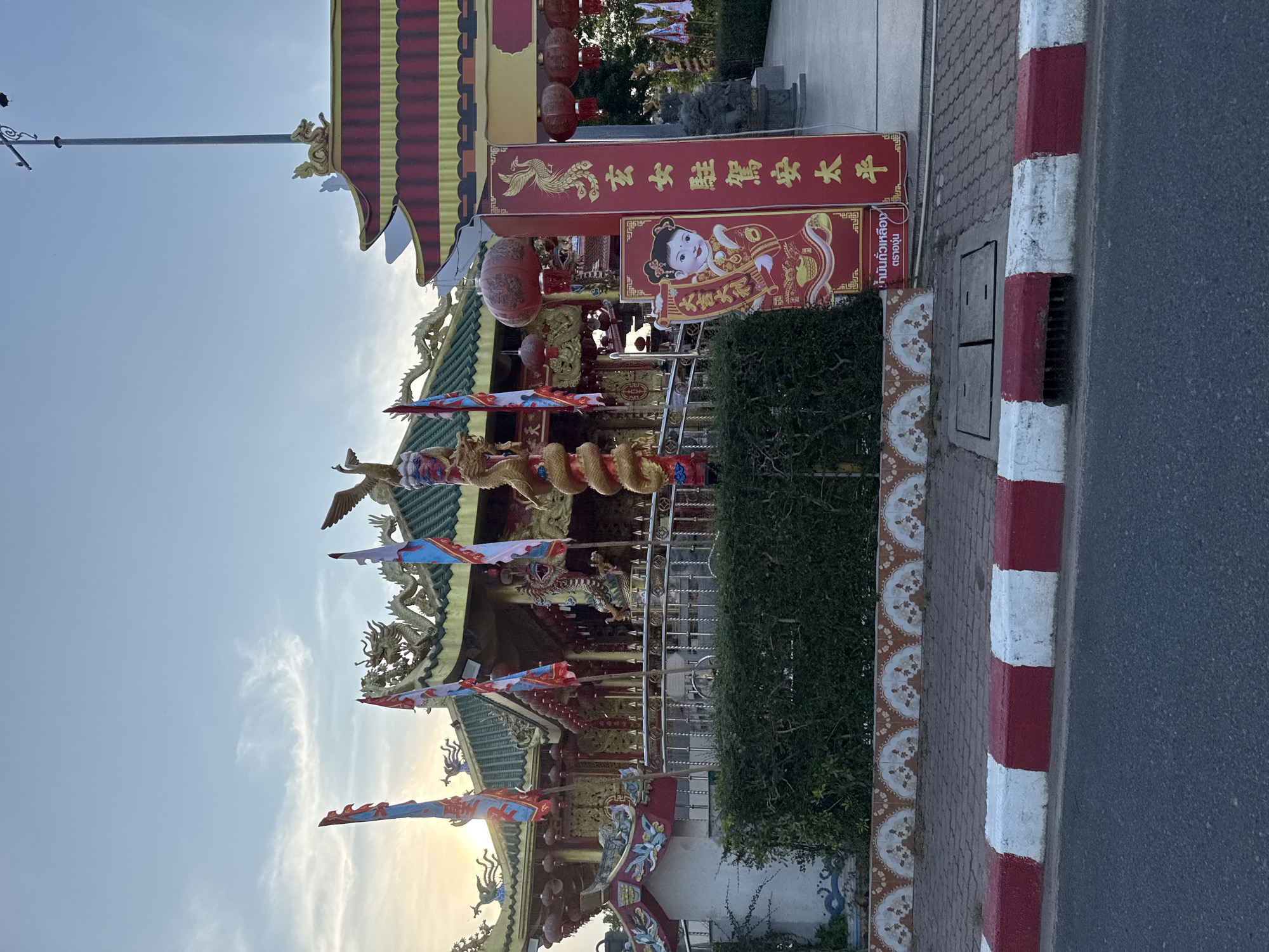 Traditional shrine and new tree plantings documented in Phuket