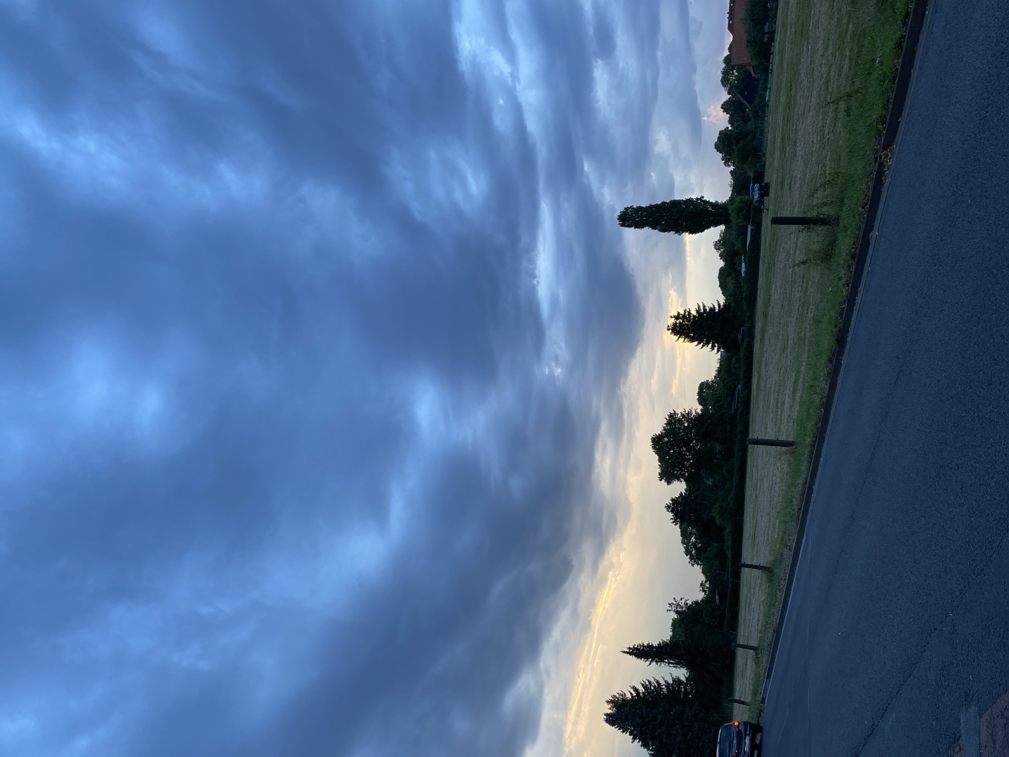 Storm clouds gather over Rinteln at dusk