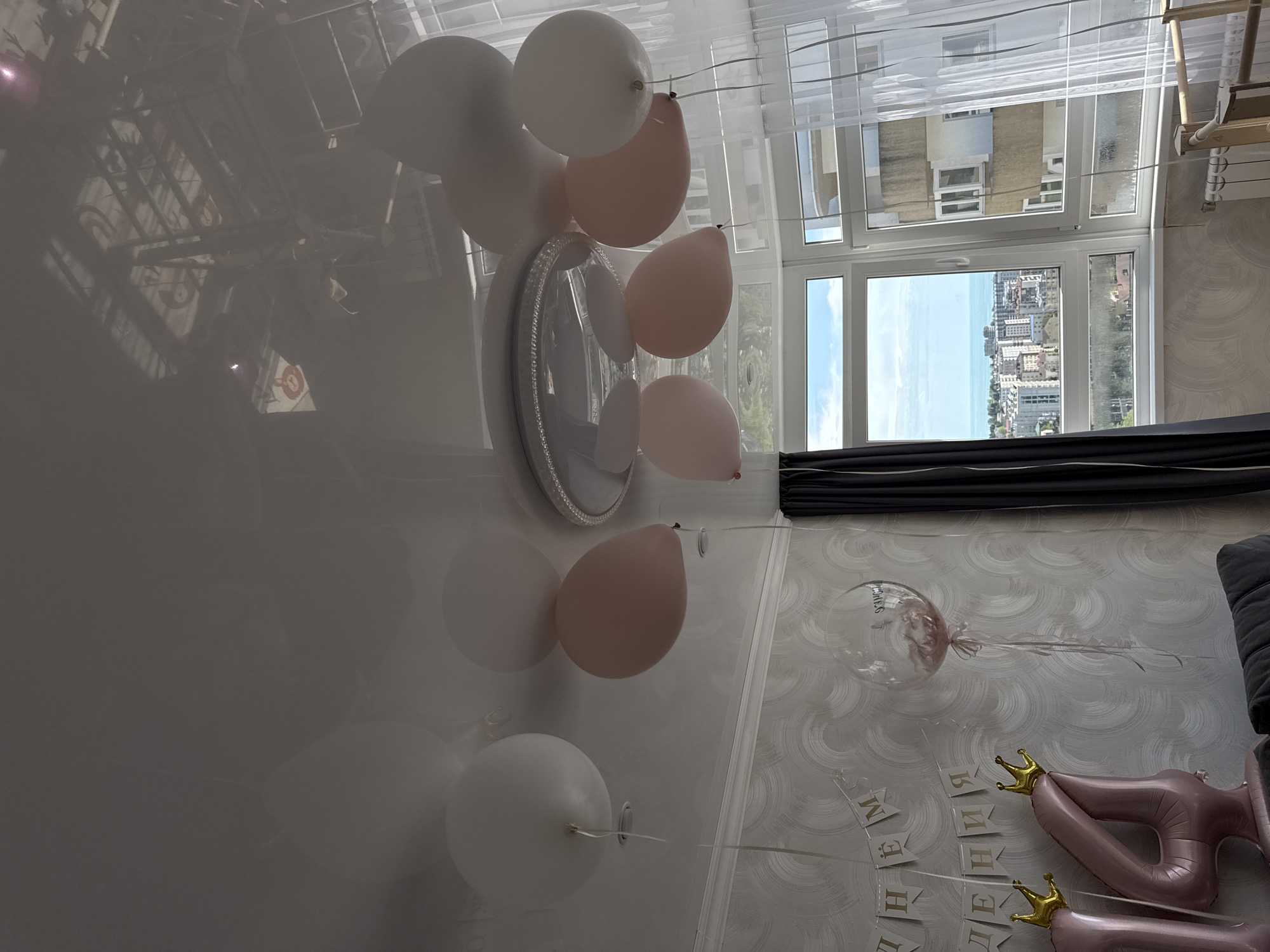 Couple celebrates with balloon decorations in Sochi apartment