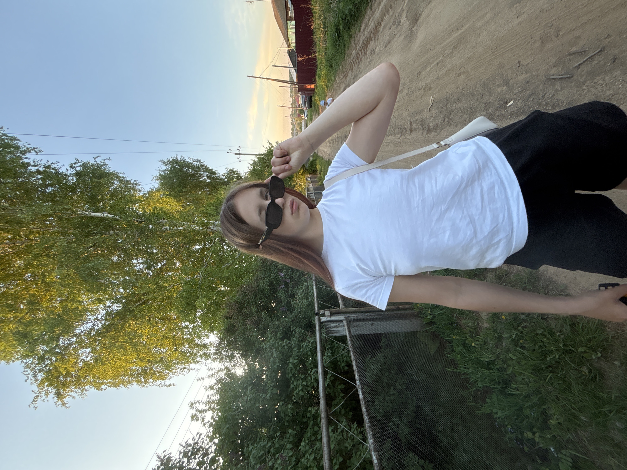 Mother and child enjoy afternoon outing in Russian village