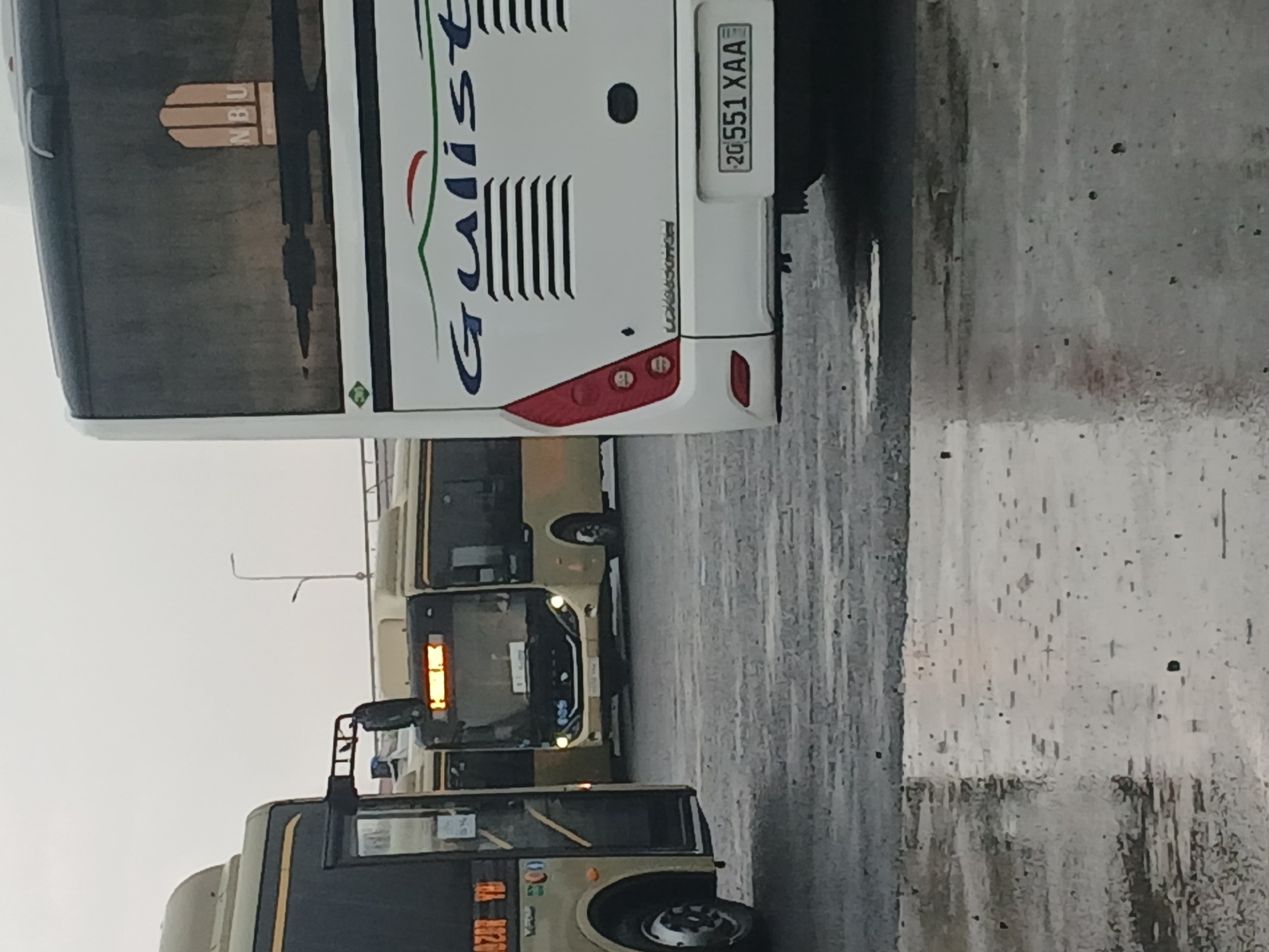 Rain soaks Gulistan bus station on a June afternoon