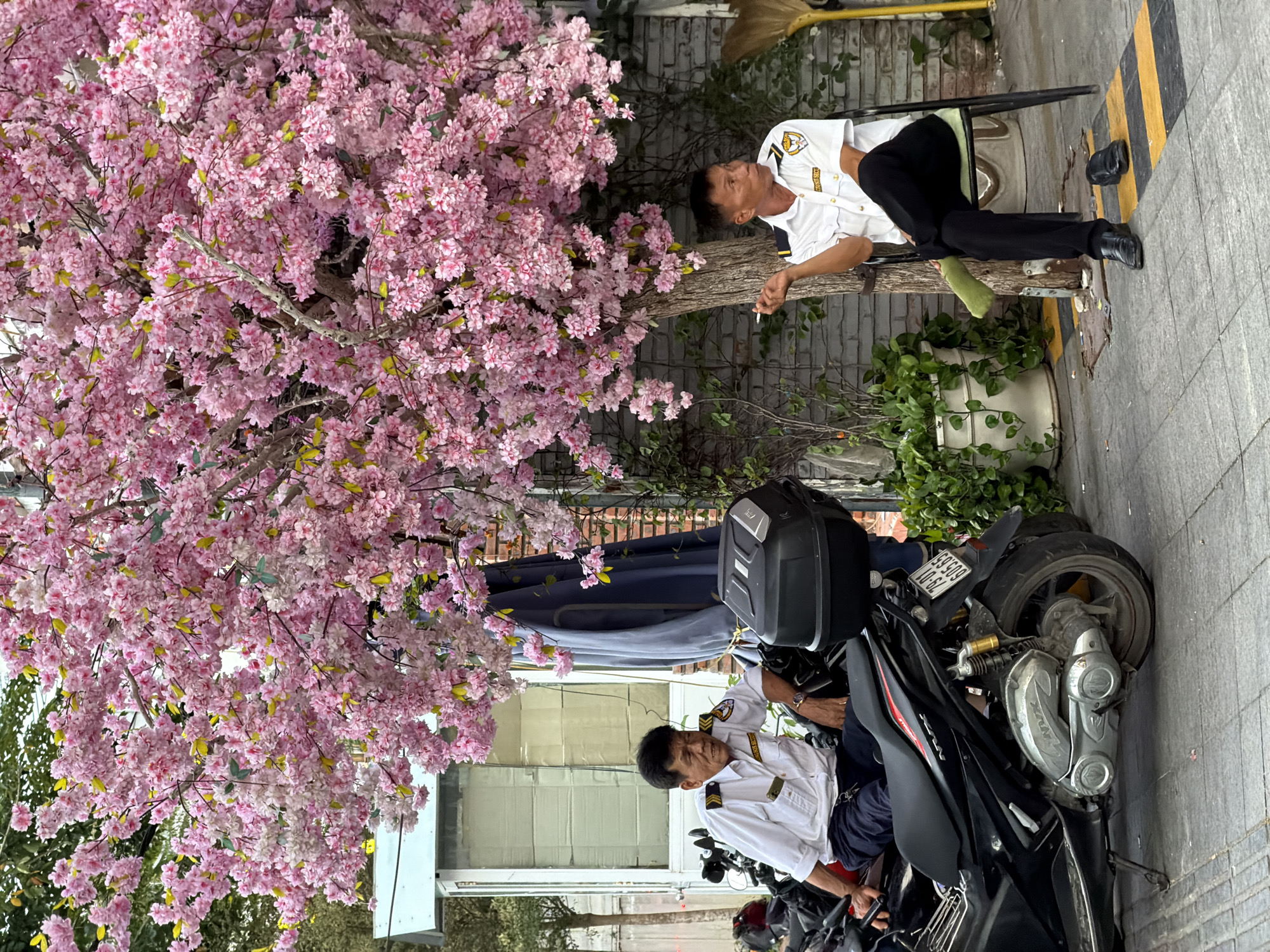 Security guards take break in Nha Trang Ward