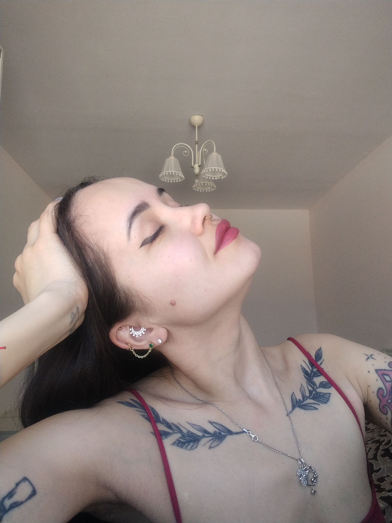 Woman documents morning skincare routine with cat in Russia