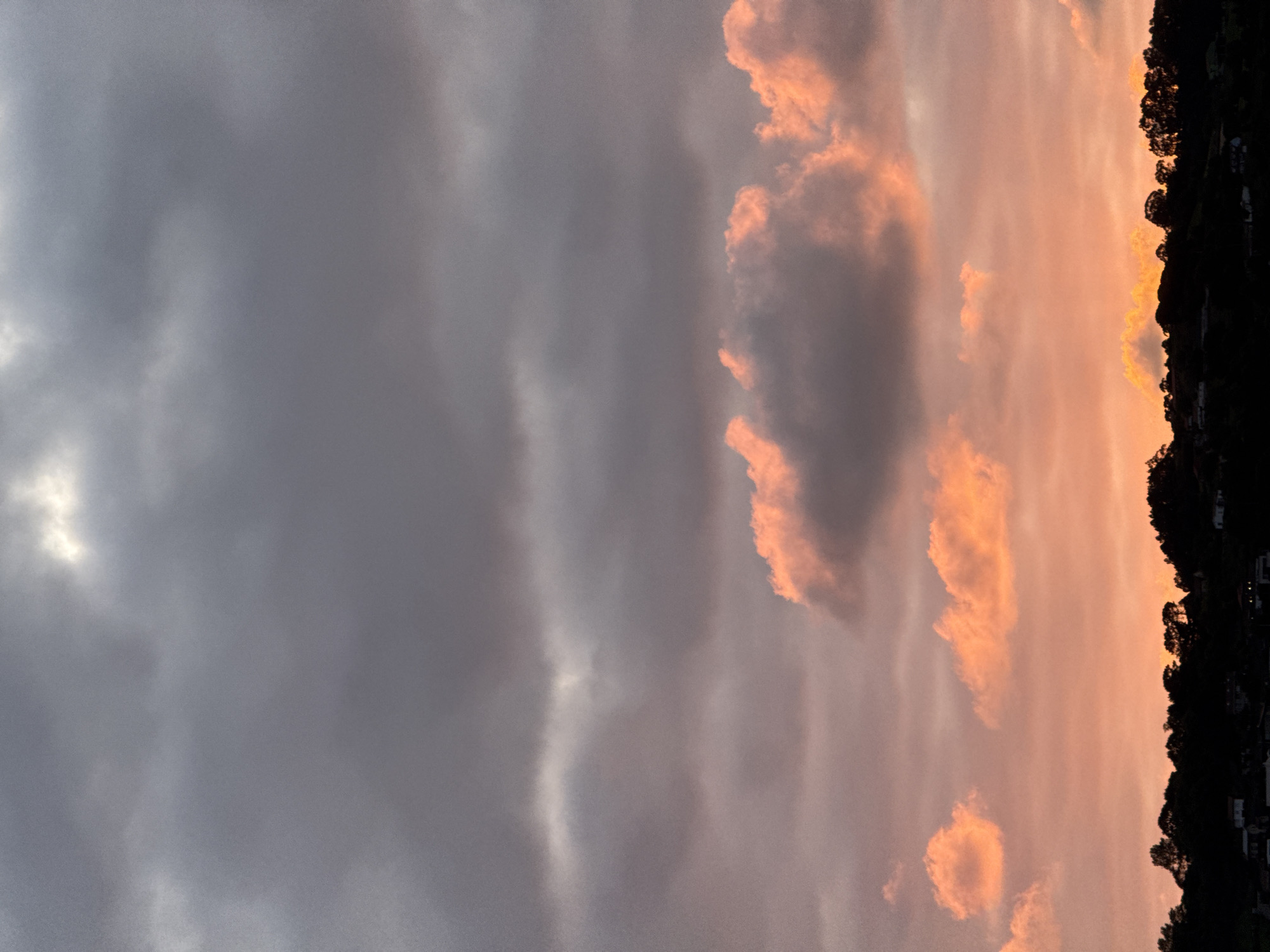 Dramatic sunset captured across Gijón's coastline and beaches