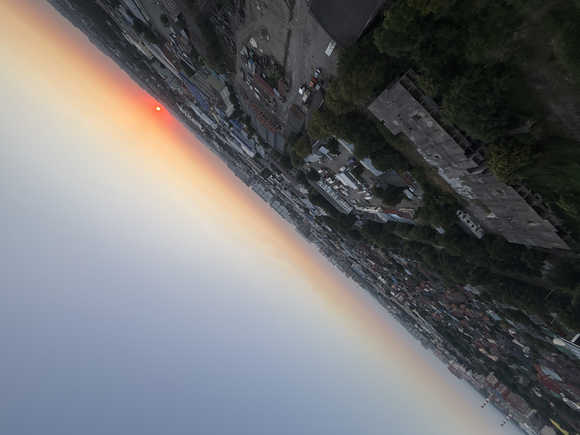 Krasnodar at sunset from above, sky ablaze with color.