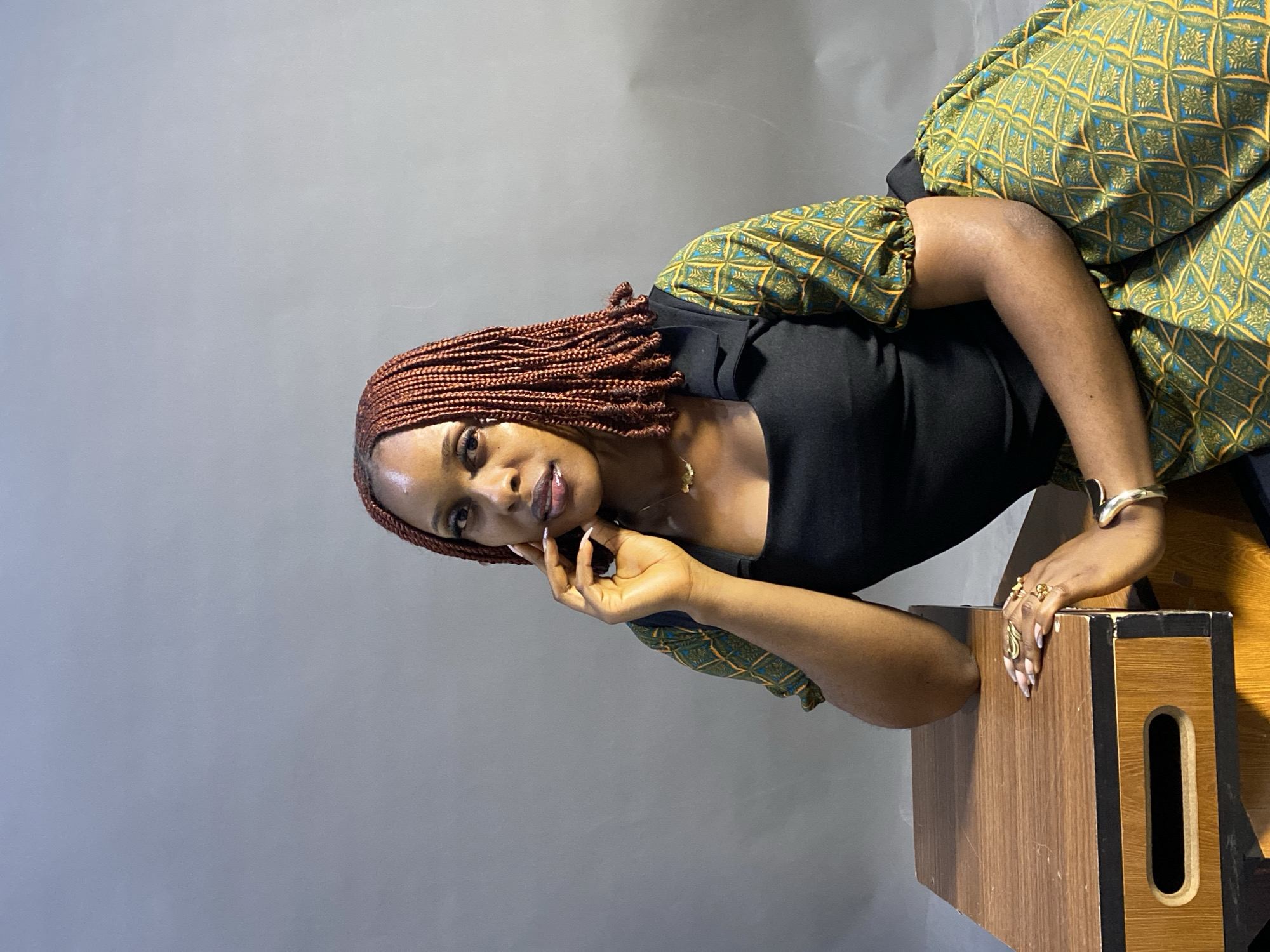 Woman poses for studio photograph in Jos, Nigeria