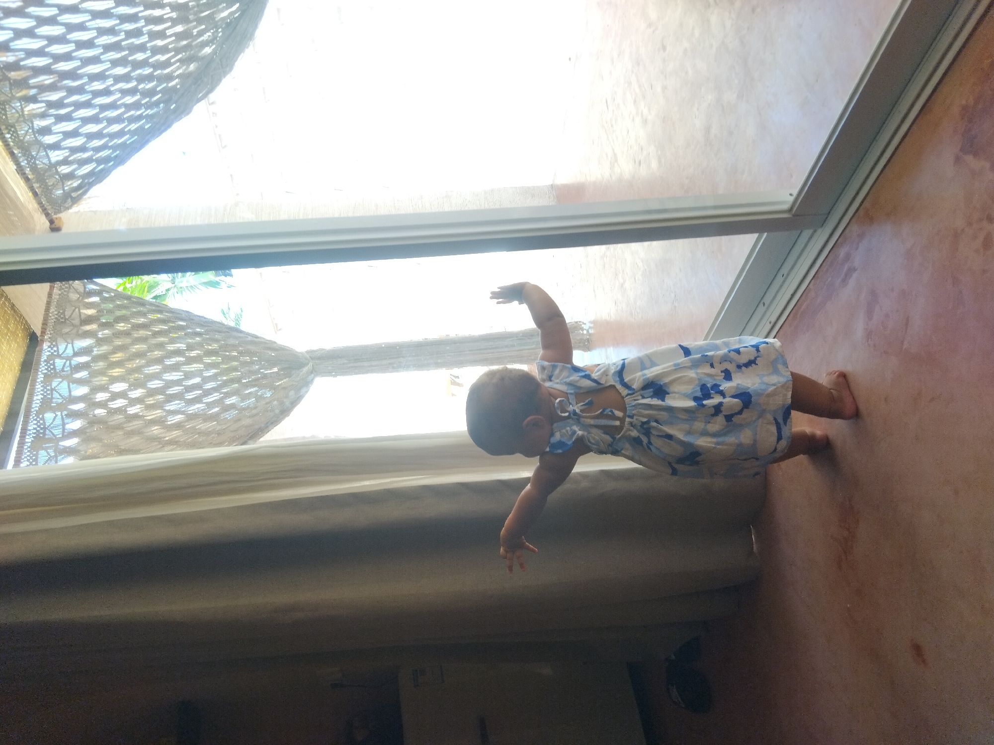 Domestic morning moments captured: baby, caregiver, home spaces documented