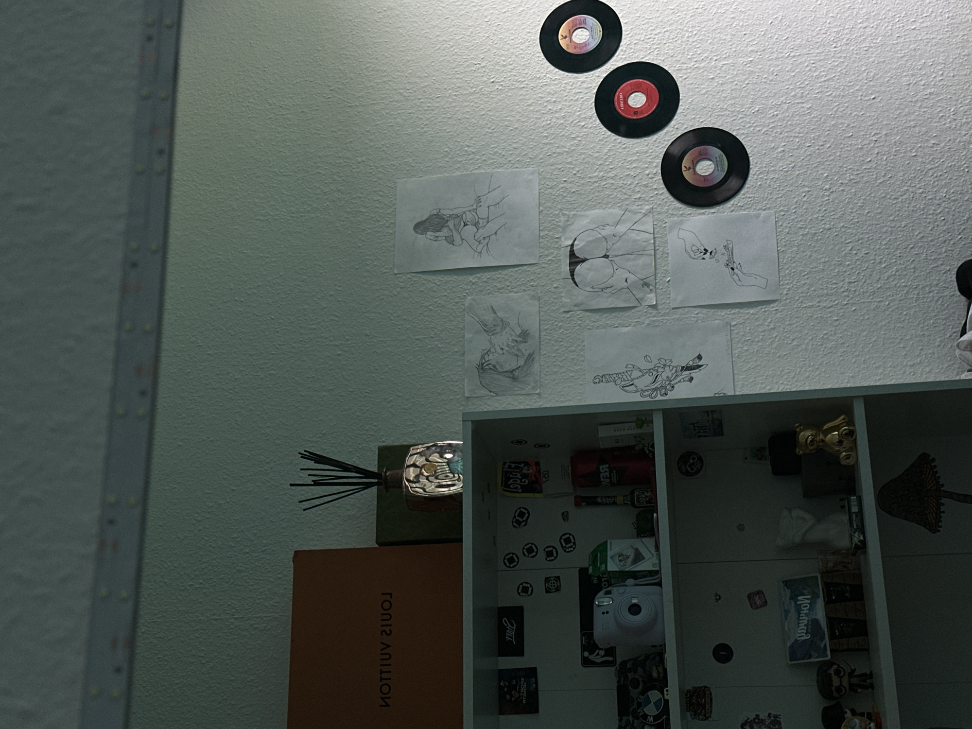 Vinyl records, bead art, and shelves inside a Roskilde apartment