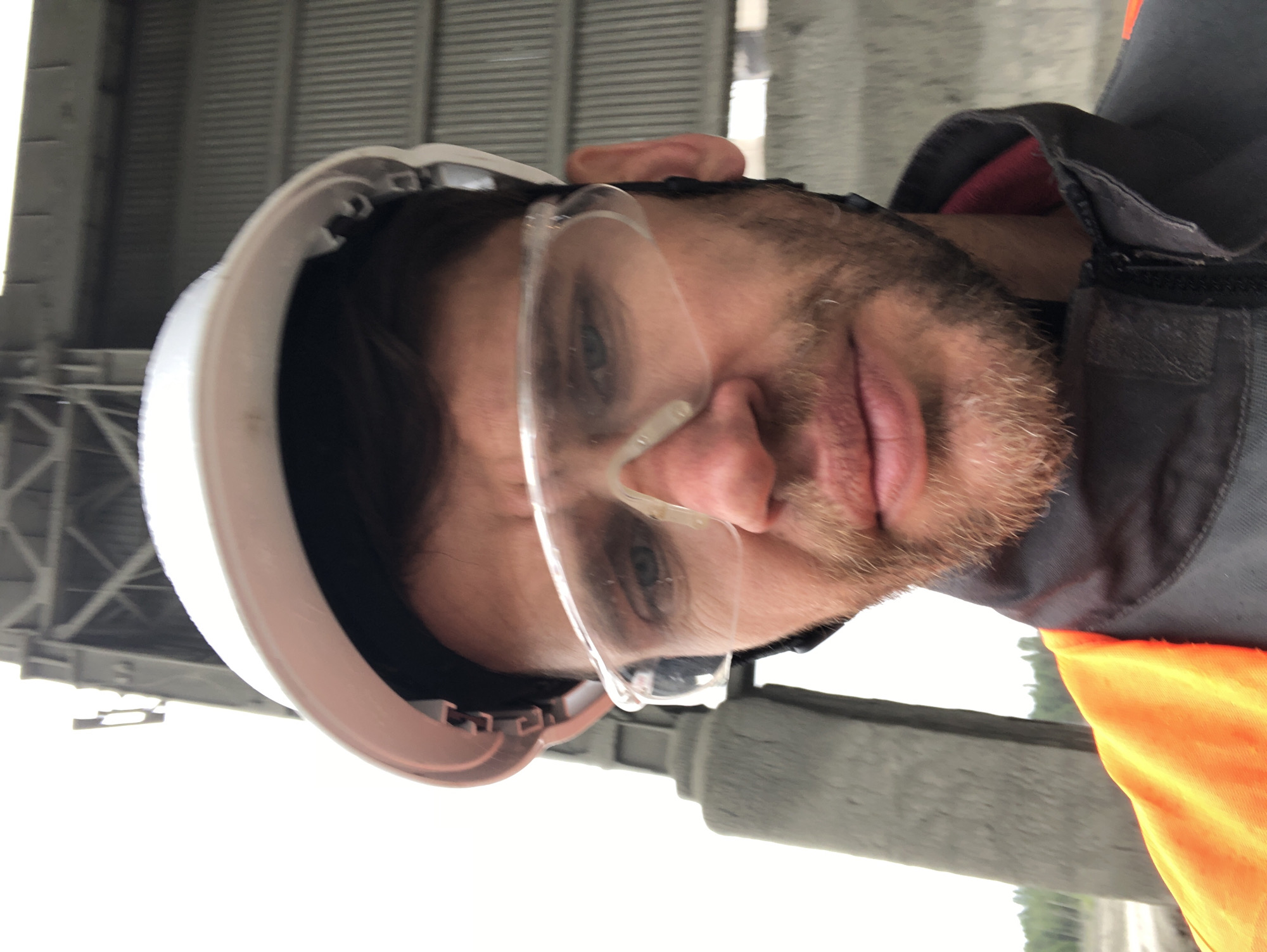 Safety gear close-up at a worksite in Slantsy, Russia.