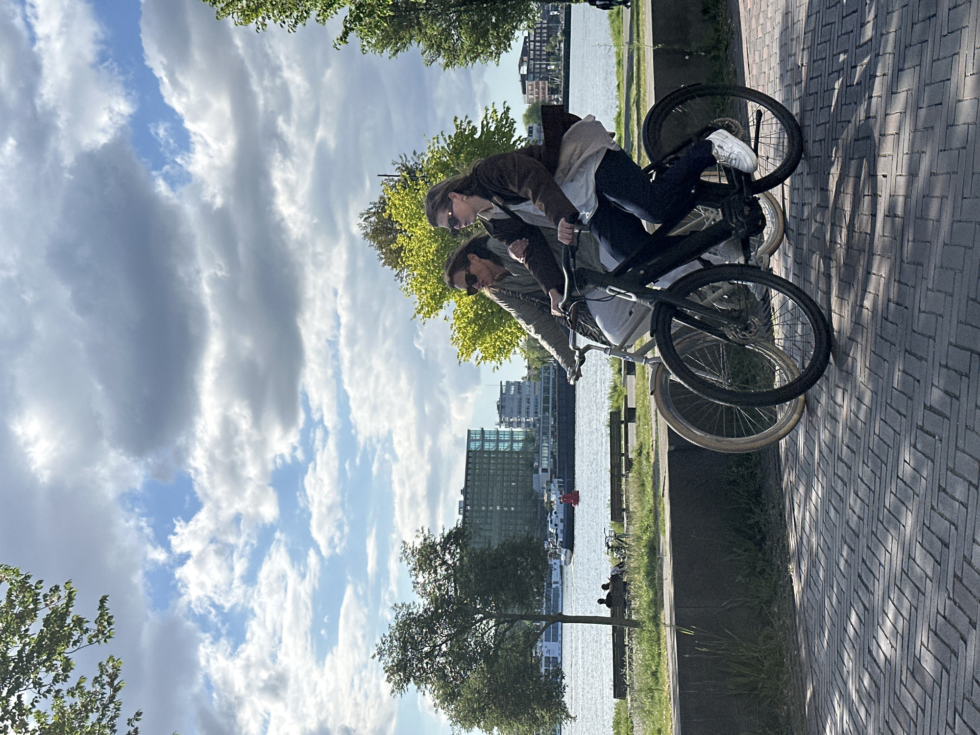 Sunny afternoon life captured along Amsterdam waterfront