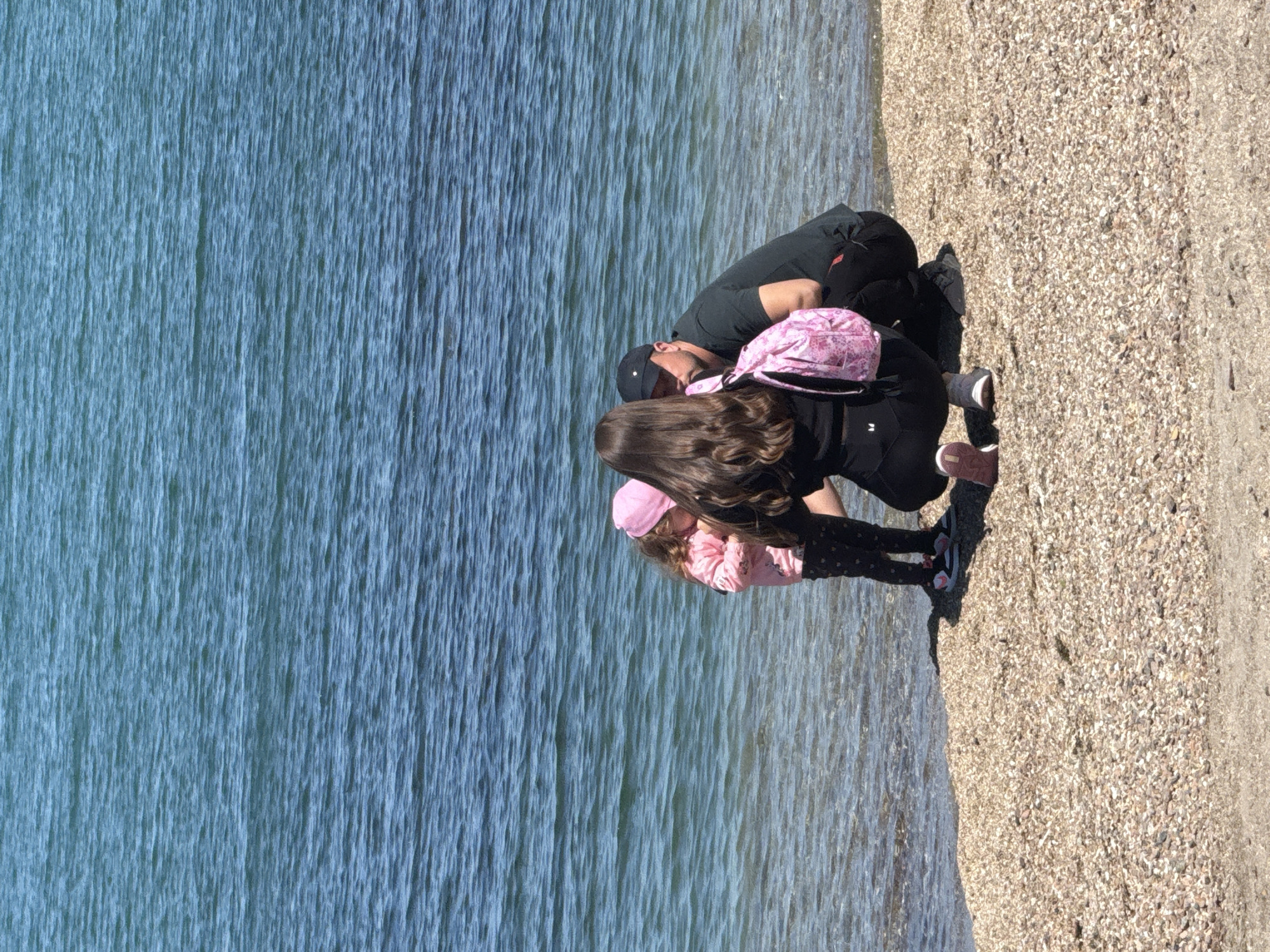 Family beach day with child playing at Burgas wakeboarding facility