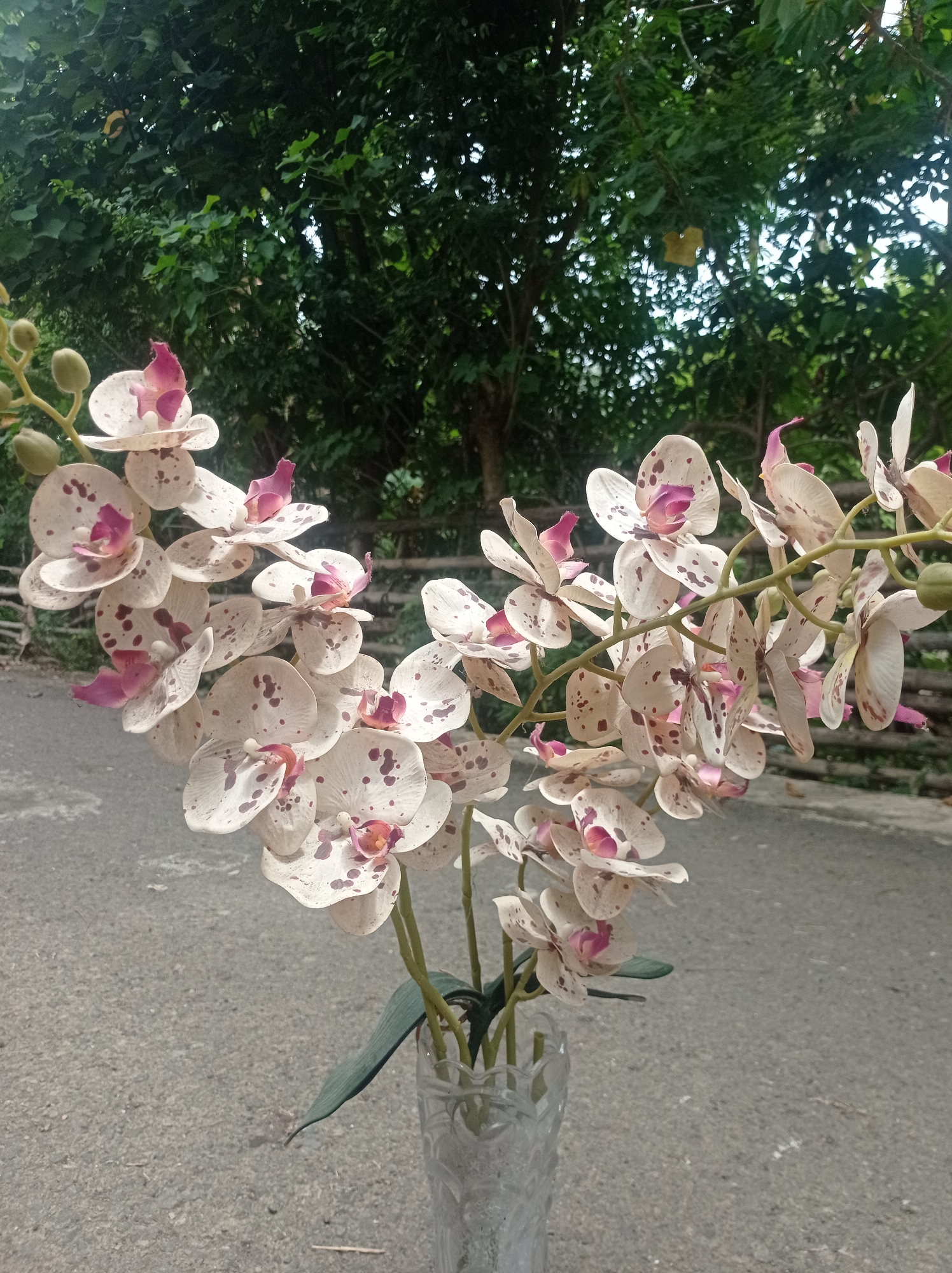 Artificial flowers and mosque interior in coastal Indonesia