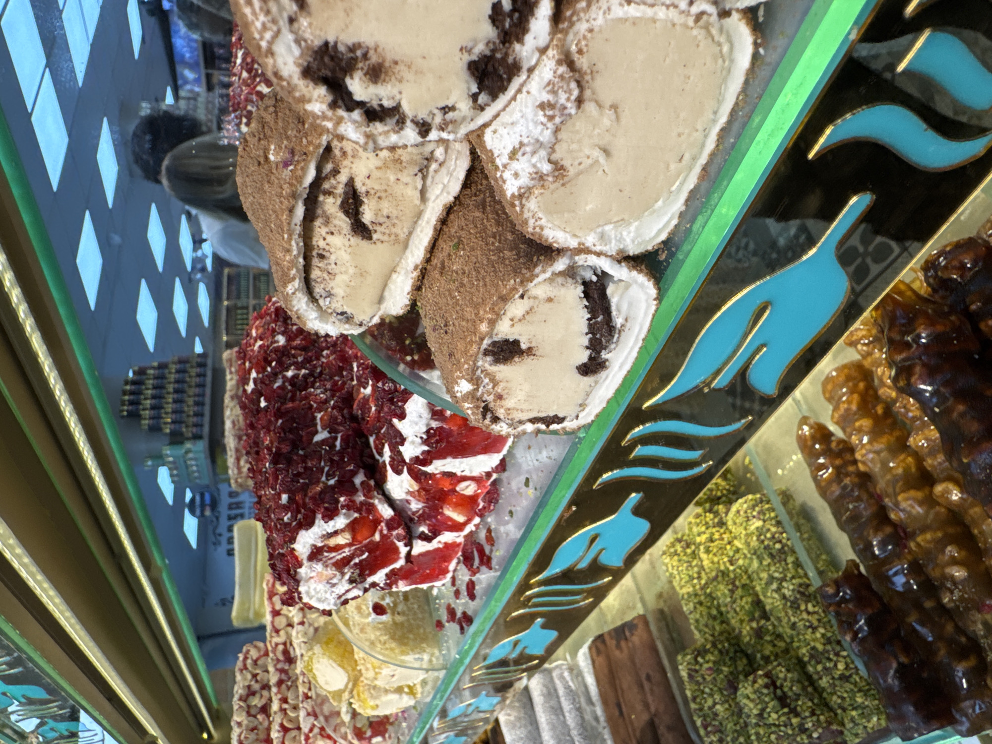 Turkish sweets shop serves customers in Uçhisar Beldesi