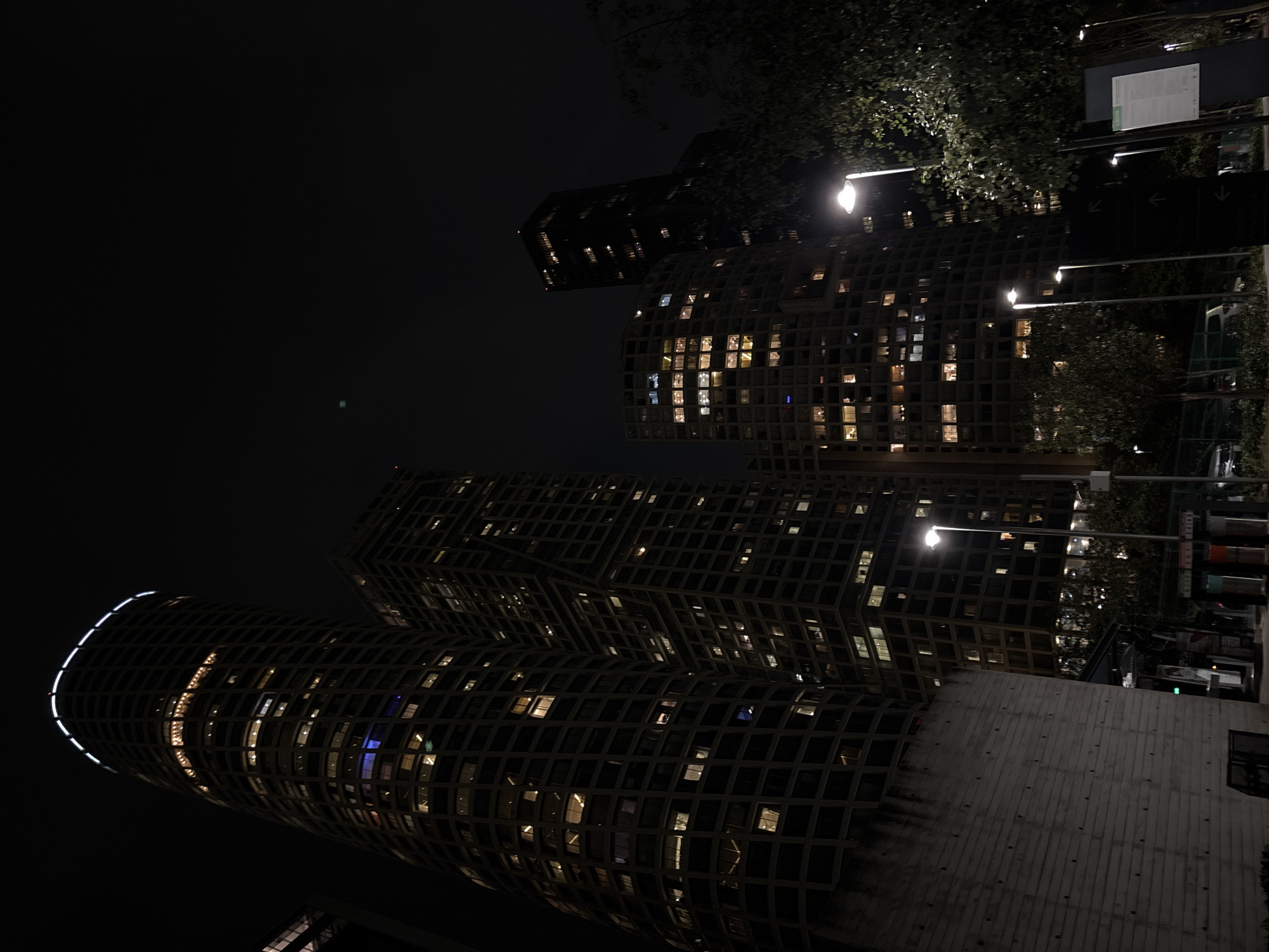 Nighttime urban high-rises captured in modern city scene