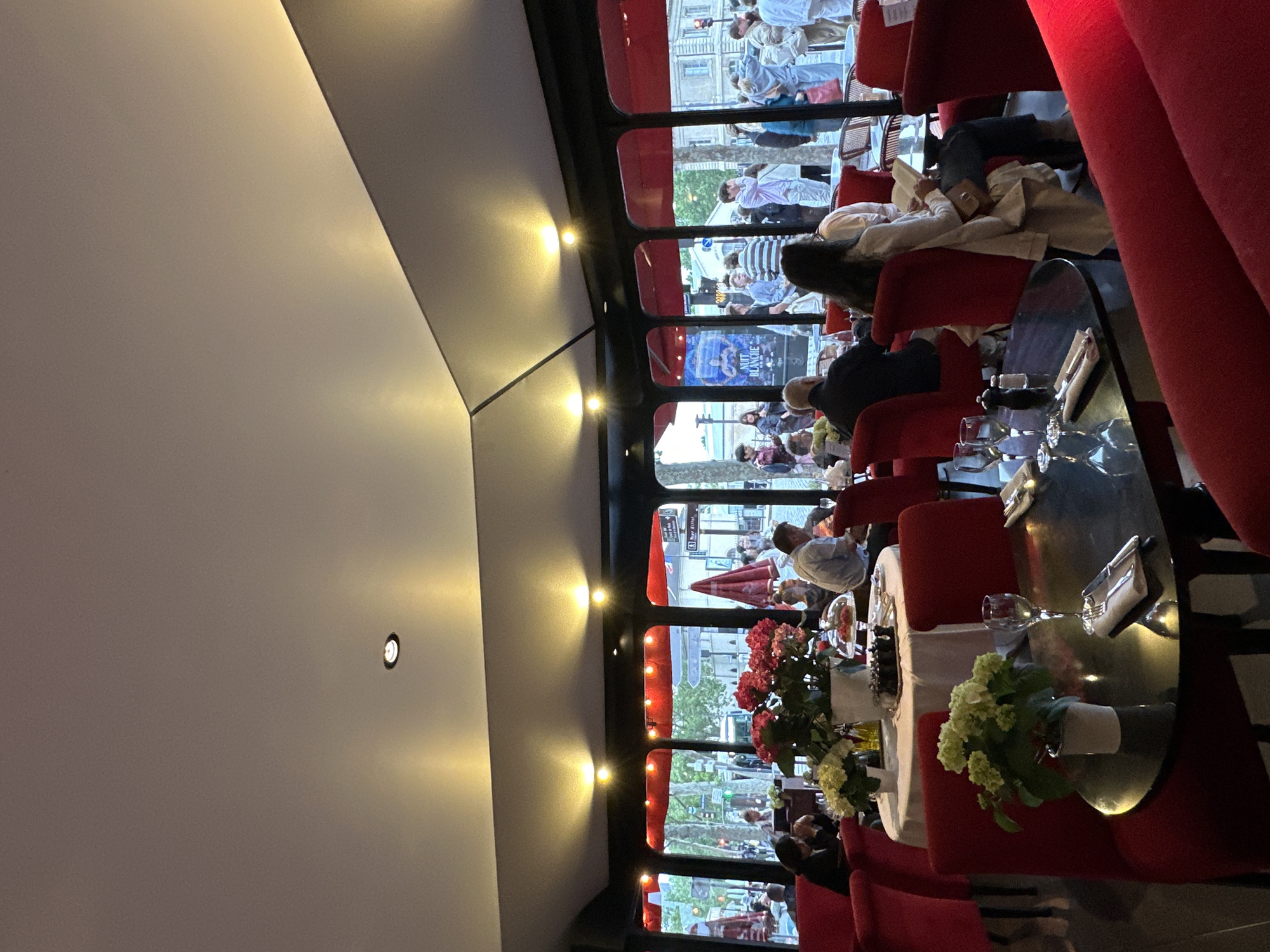 Evening dining experience documented at upscale Parisian restaurant