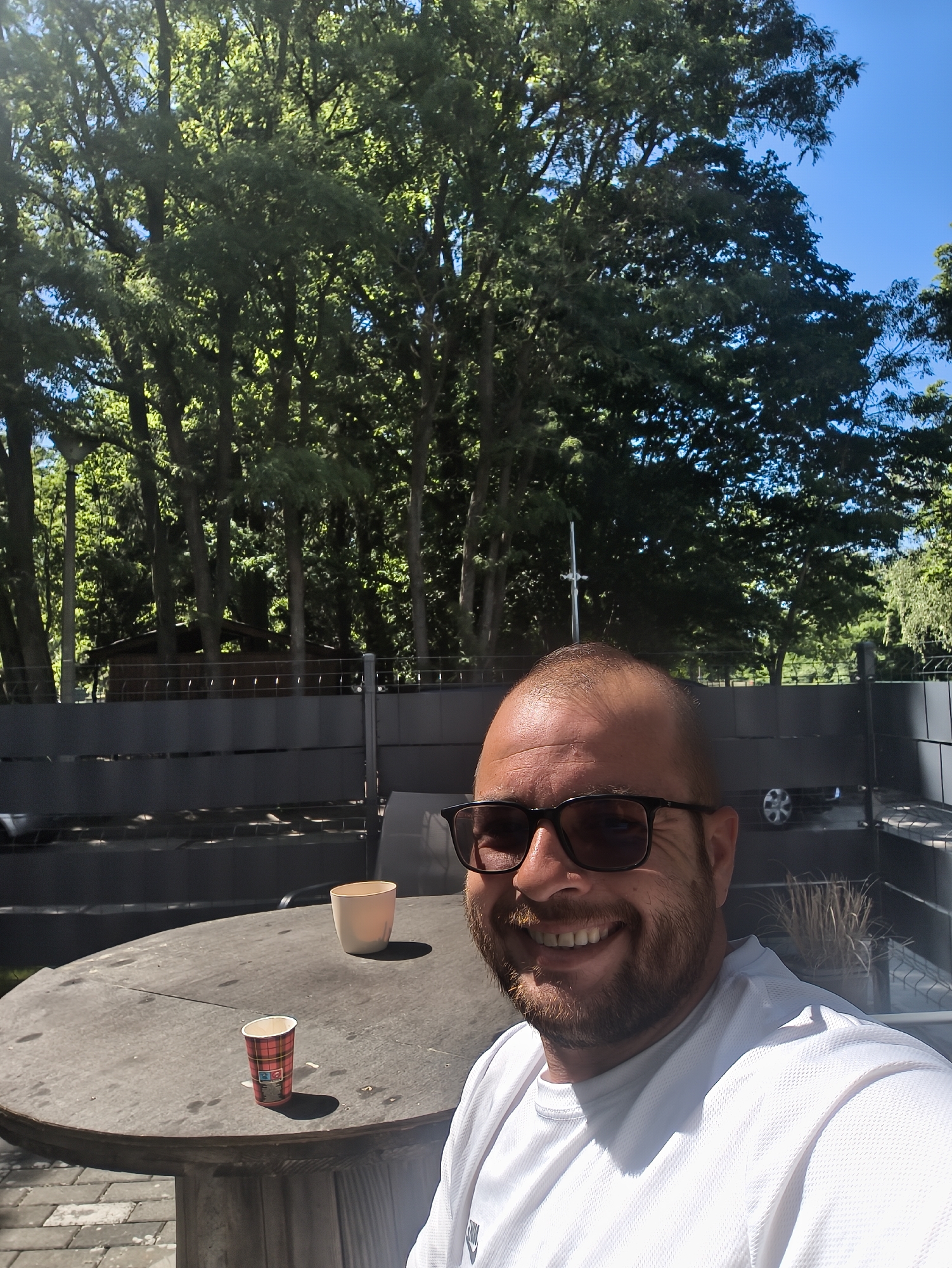 Man captures selfie and sky views at outdoor location