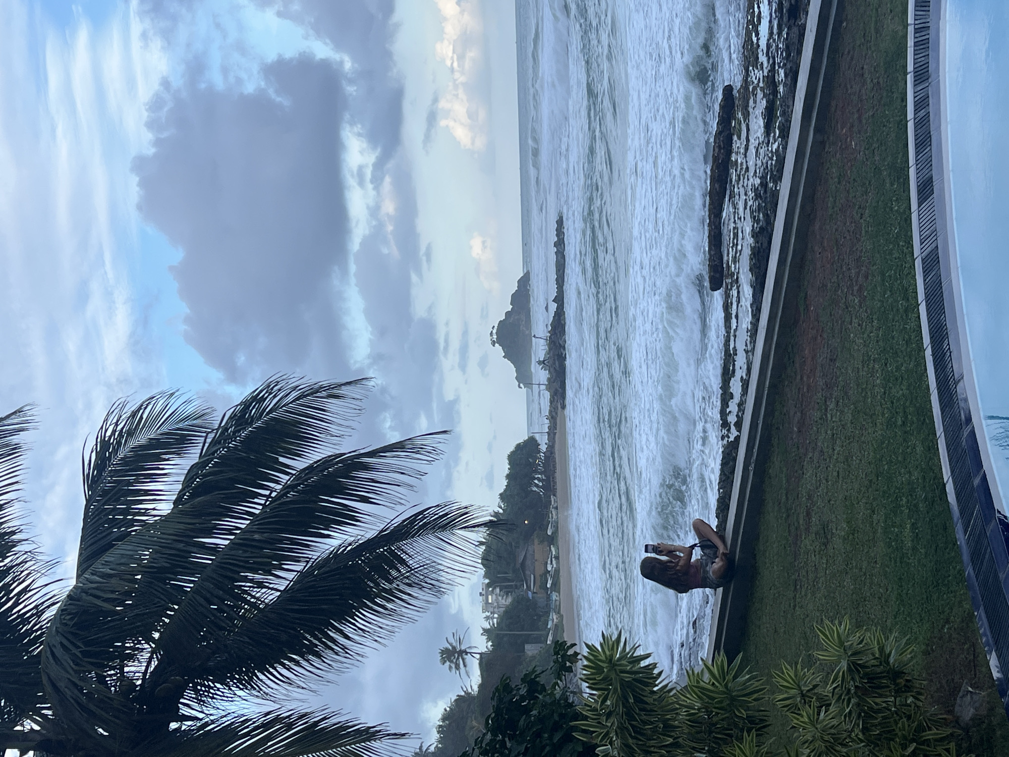 Stormy coastline and street life in Goviyapana, Sri Lanka
