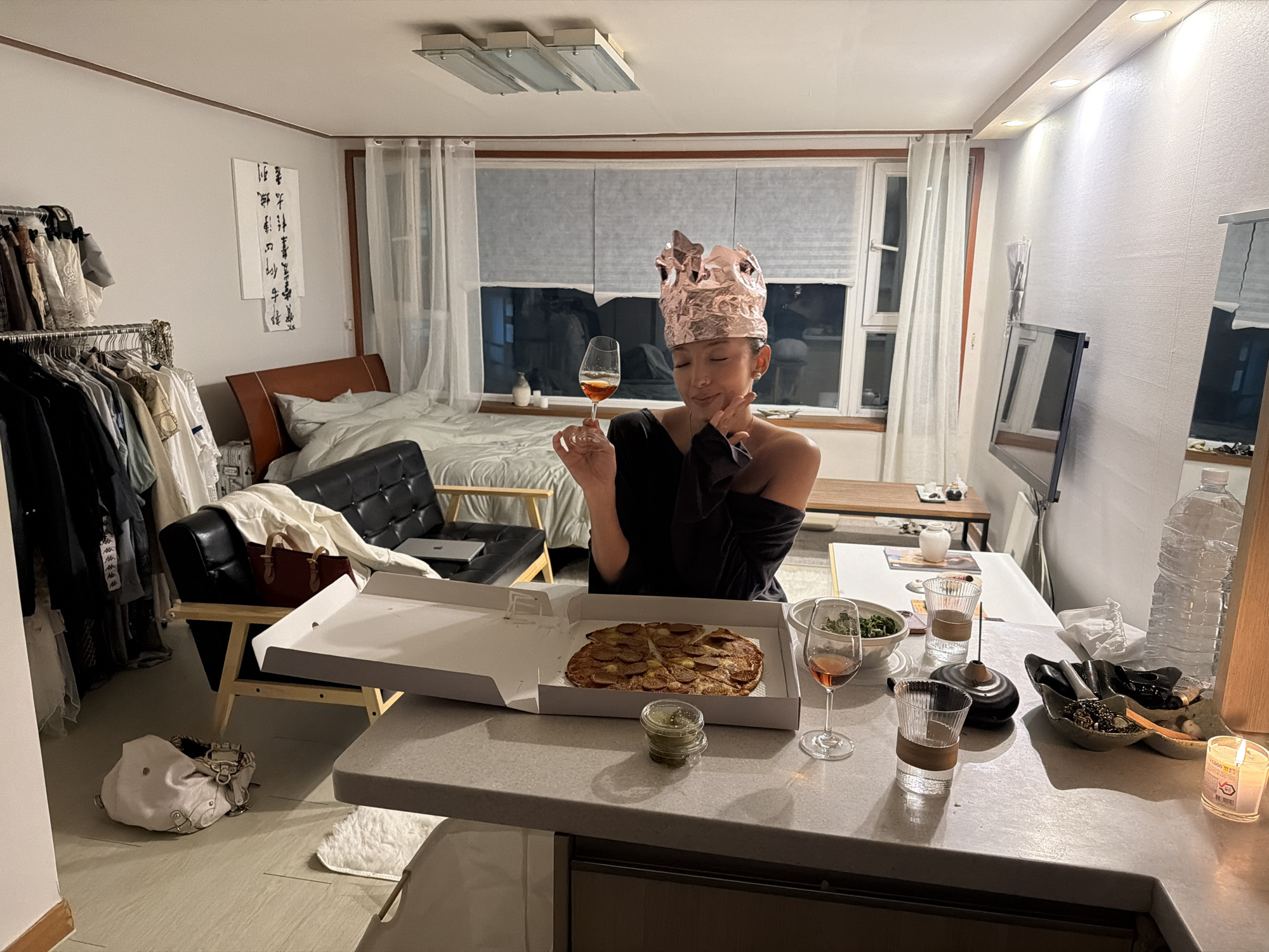 Woman wearing metallic crown observed in Seoul apartment