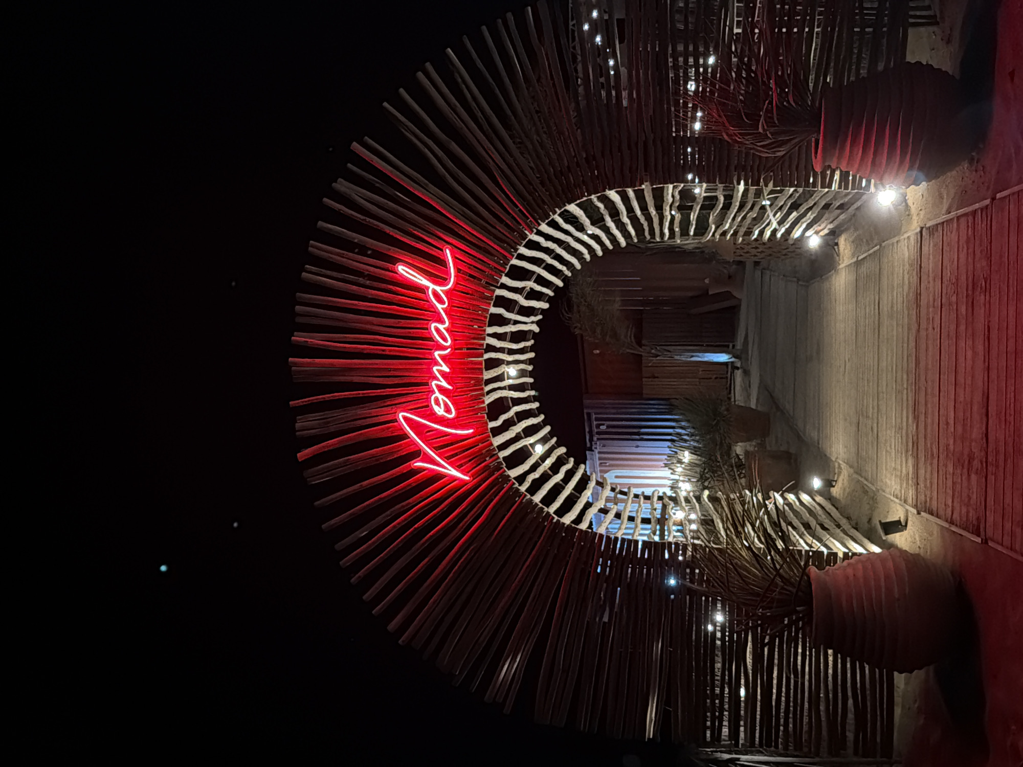 Nomad beach bar in Torreilles, lit up on a summer night