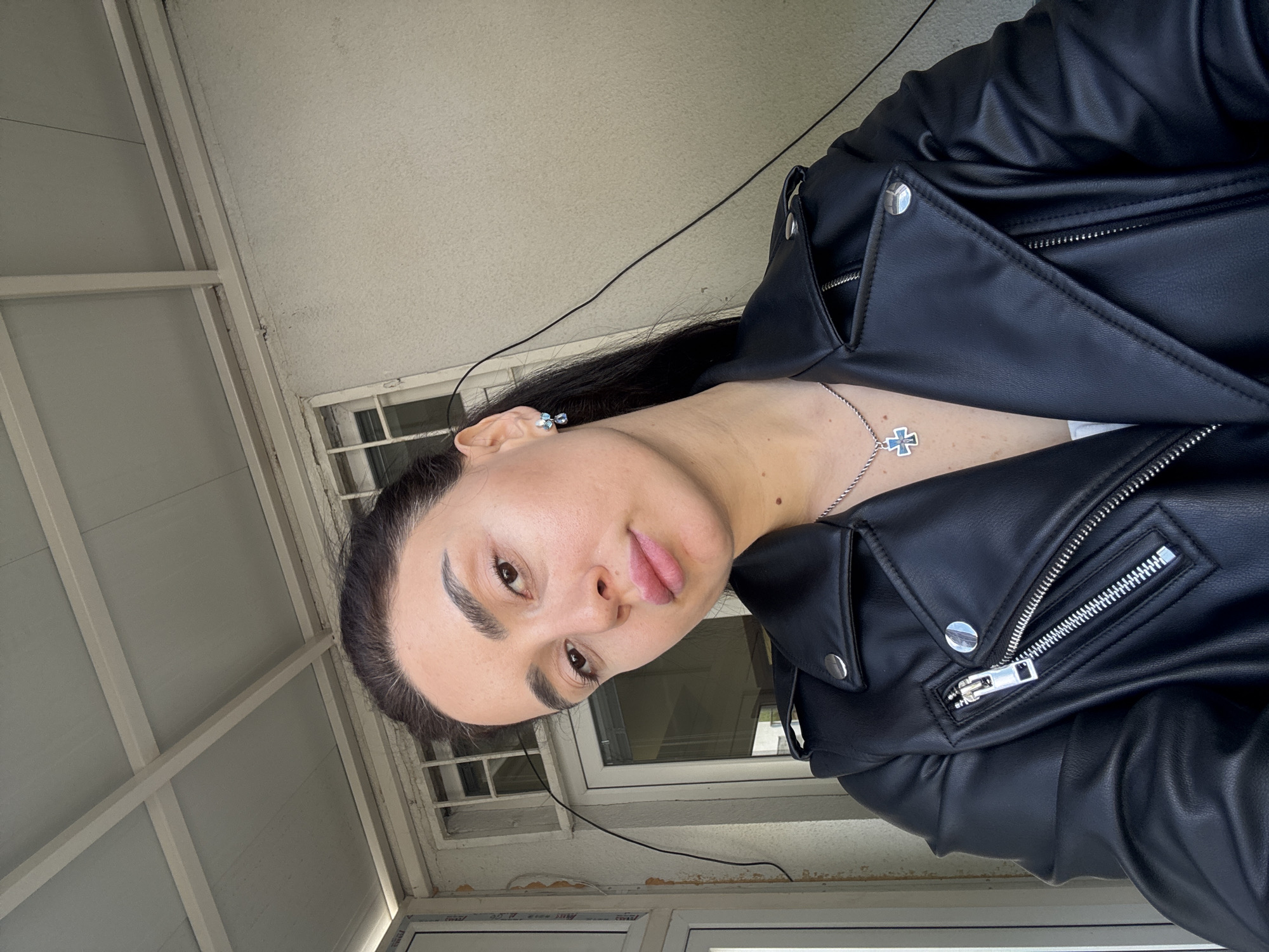 Woman photographed in multiple Tbilisi locations during morning hours