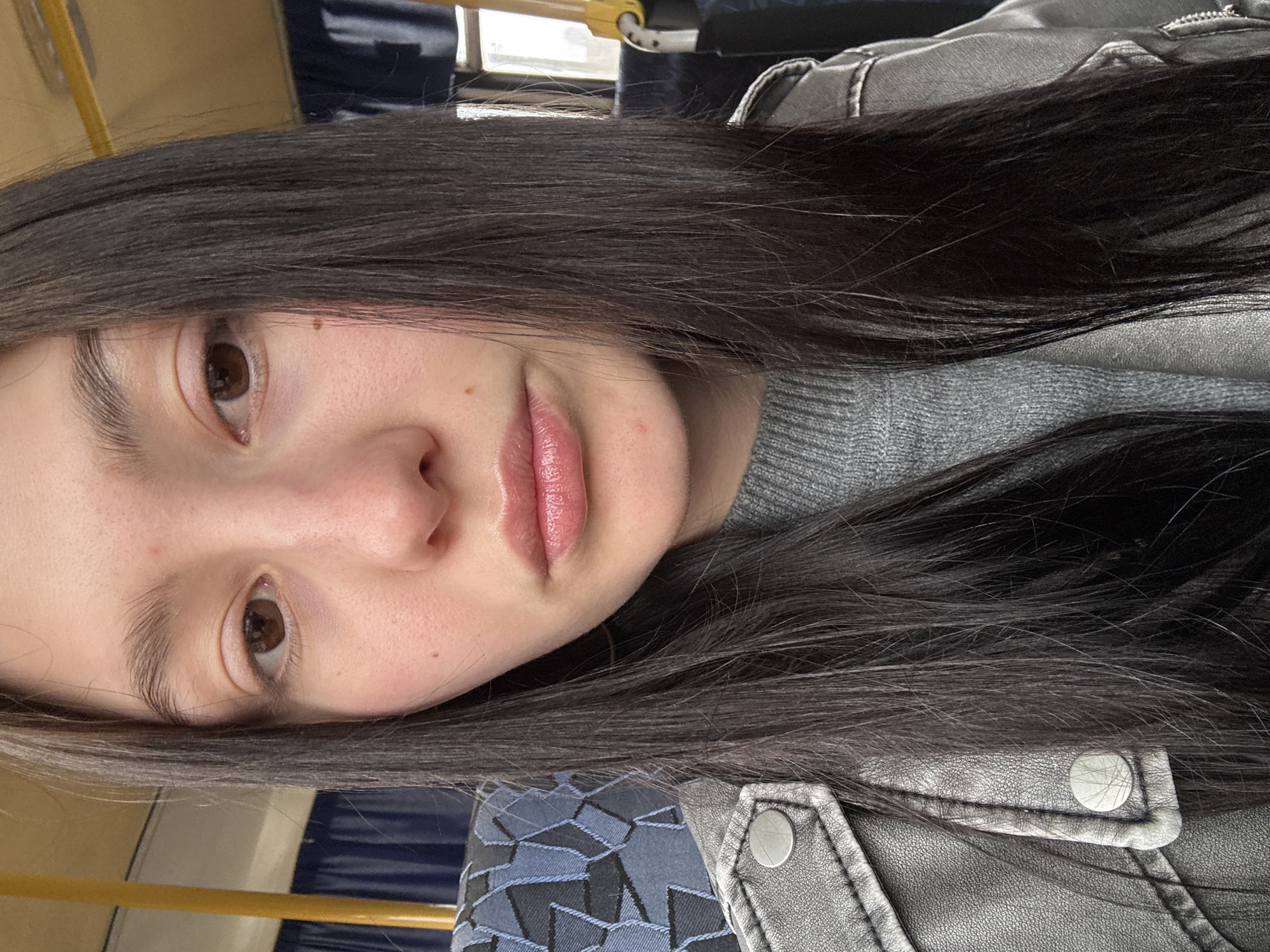 Morning commuter takes selfie on public transport in Russia