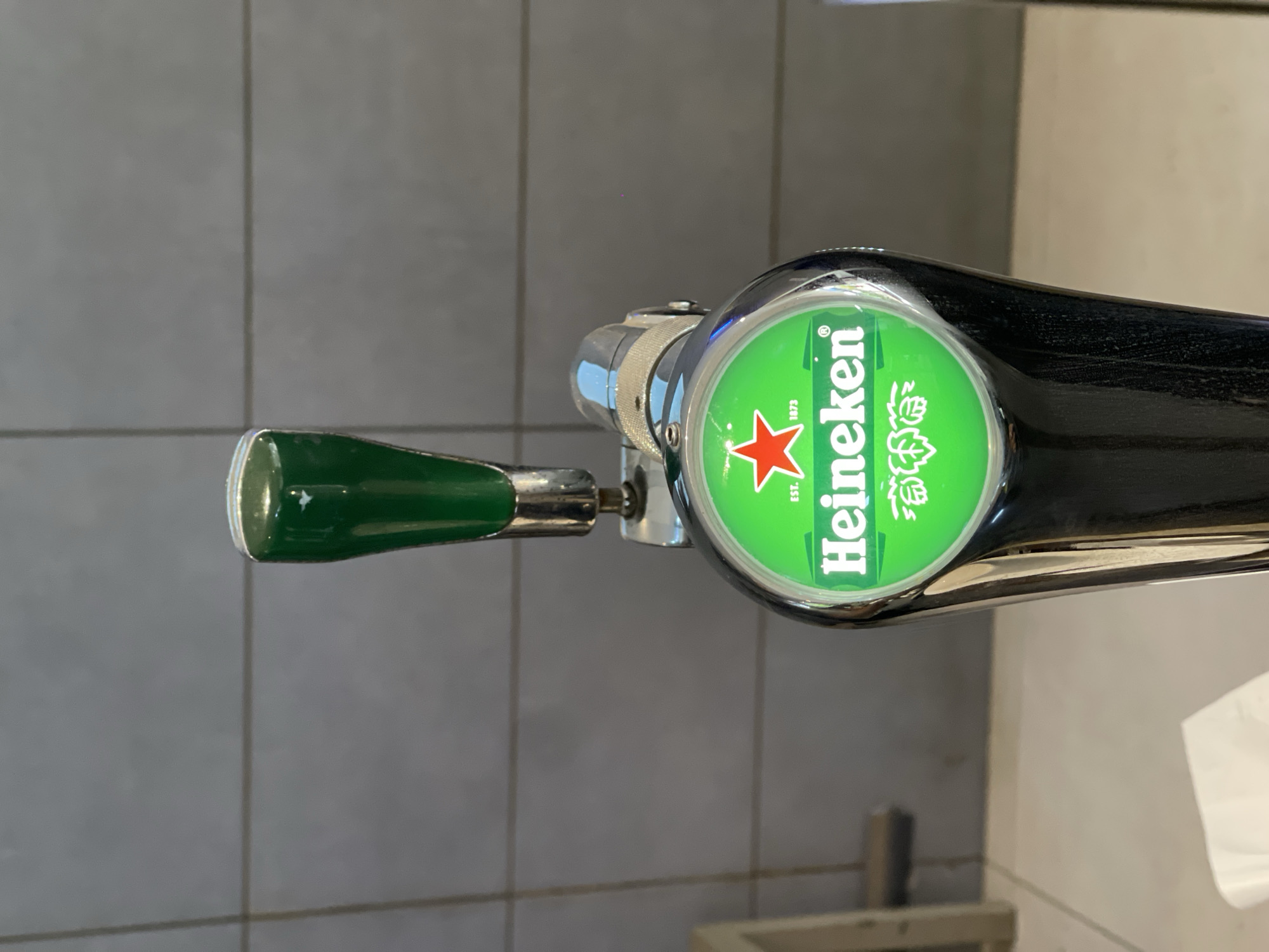 Casual afternoon drinks captured at Abuja bar establishment