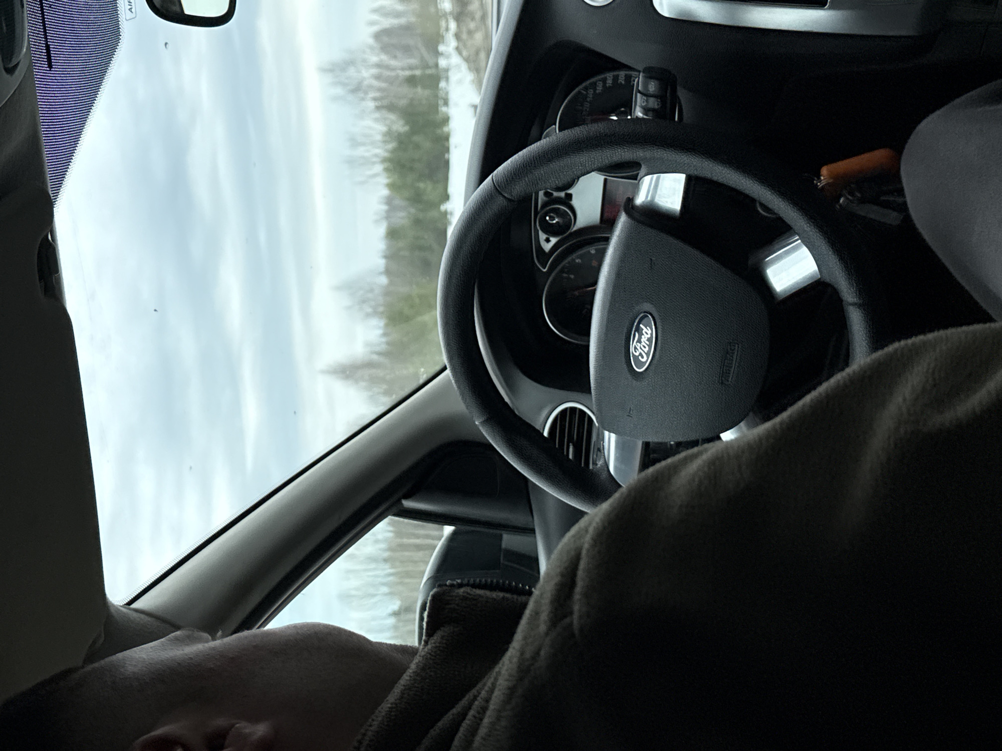 Driver slumped over wheel on rural Russian road