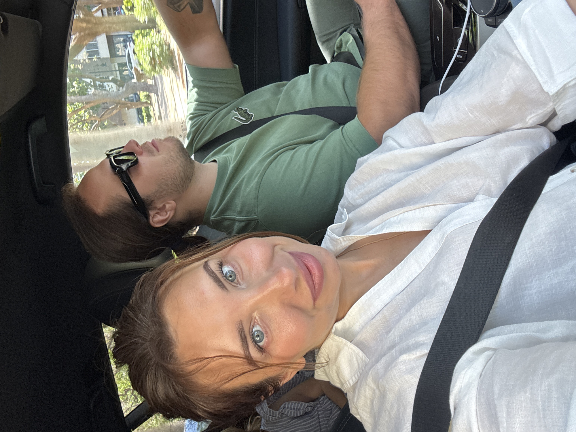 Passengers capture selfies during car ride in Valencia