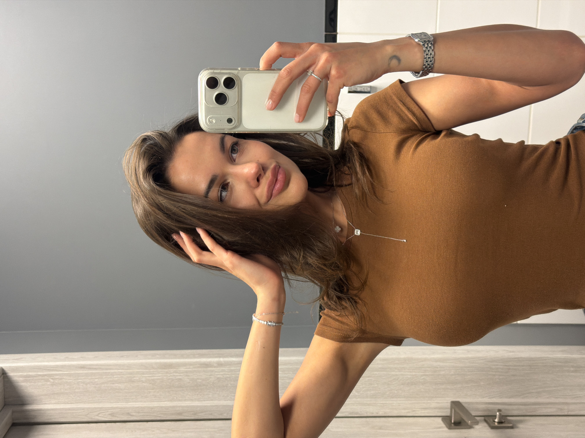 Woman takes mirror selfie in Krasnoyarsk, Russia