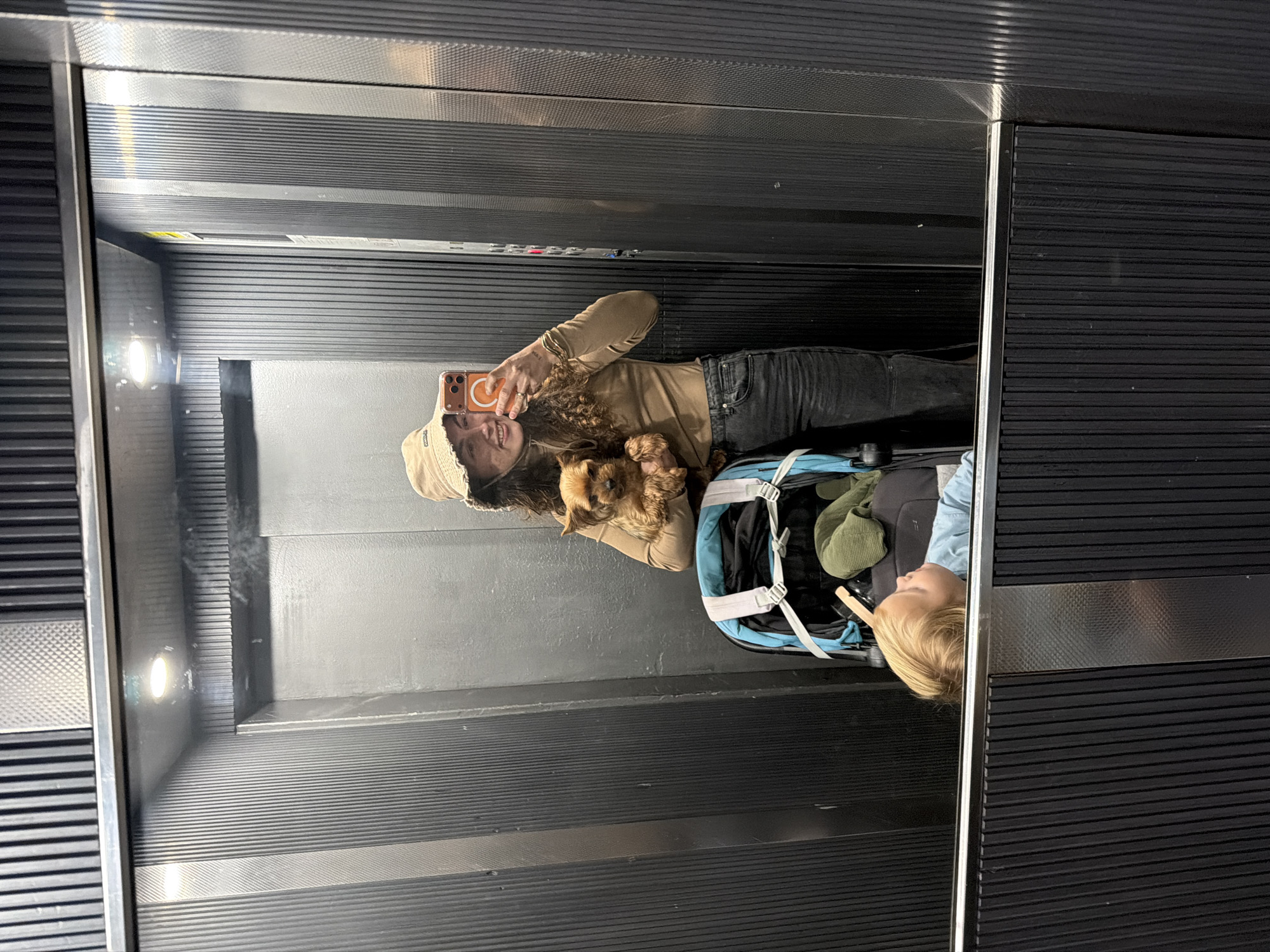Morning pet moments captured in Kiryat Bialik elevator, parking lot