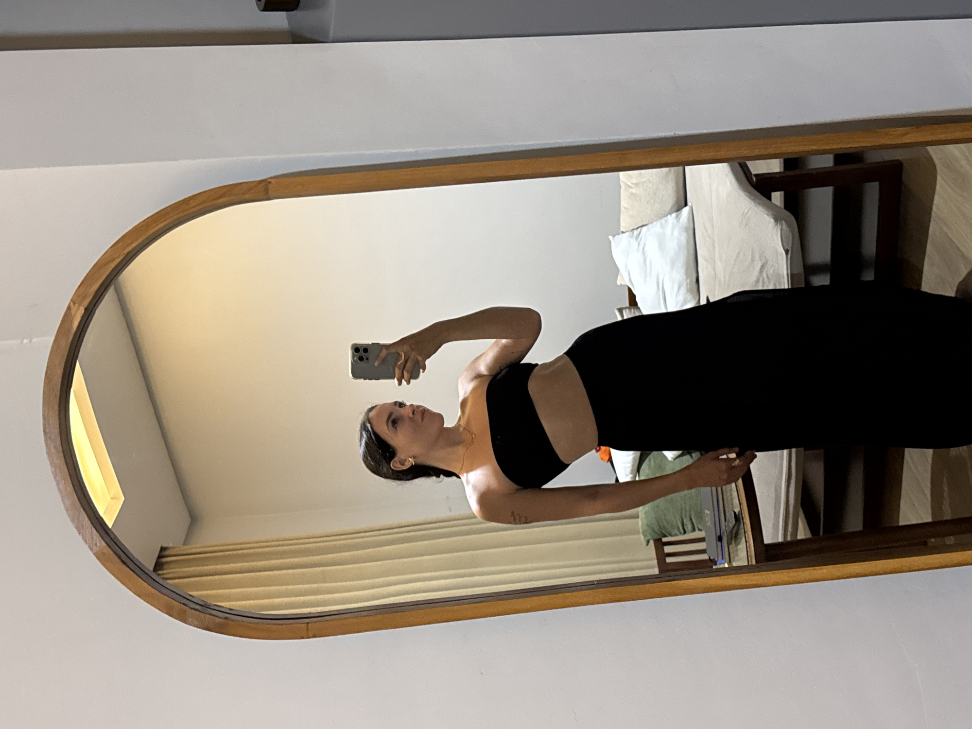 Outfit photos and mirror selfies from a Bali hotel room