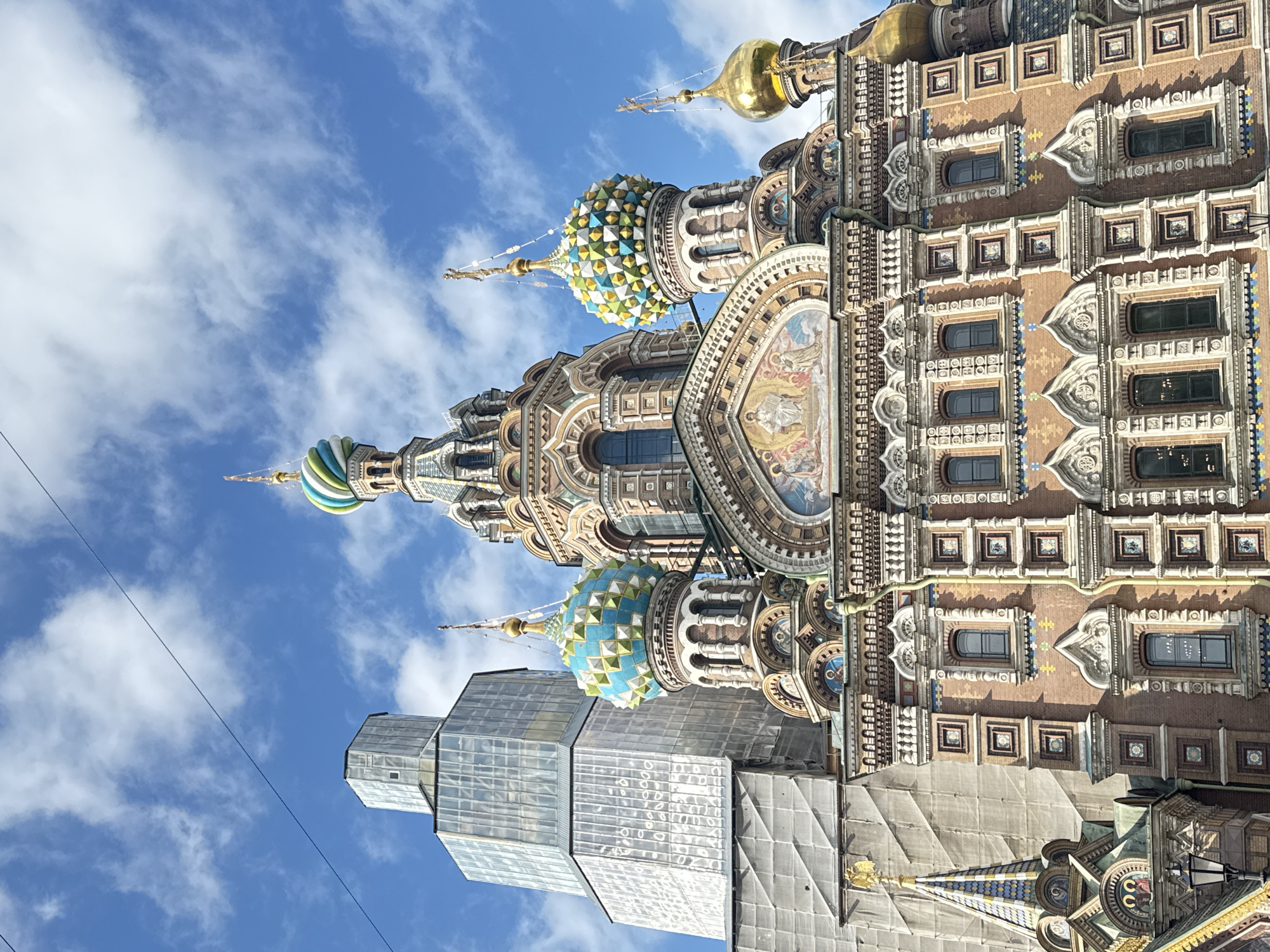 Tourist documents afternoon stroll near Saint Petersburg's Spilled Blood Church