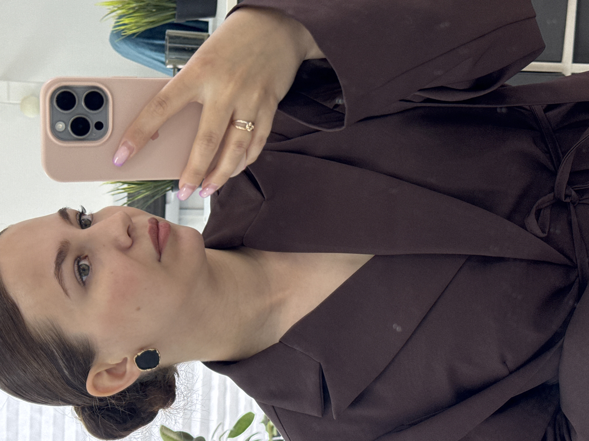 Woman takes morning selfies across multiple Chaikovsky locations
