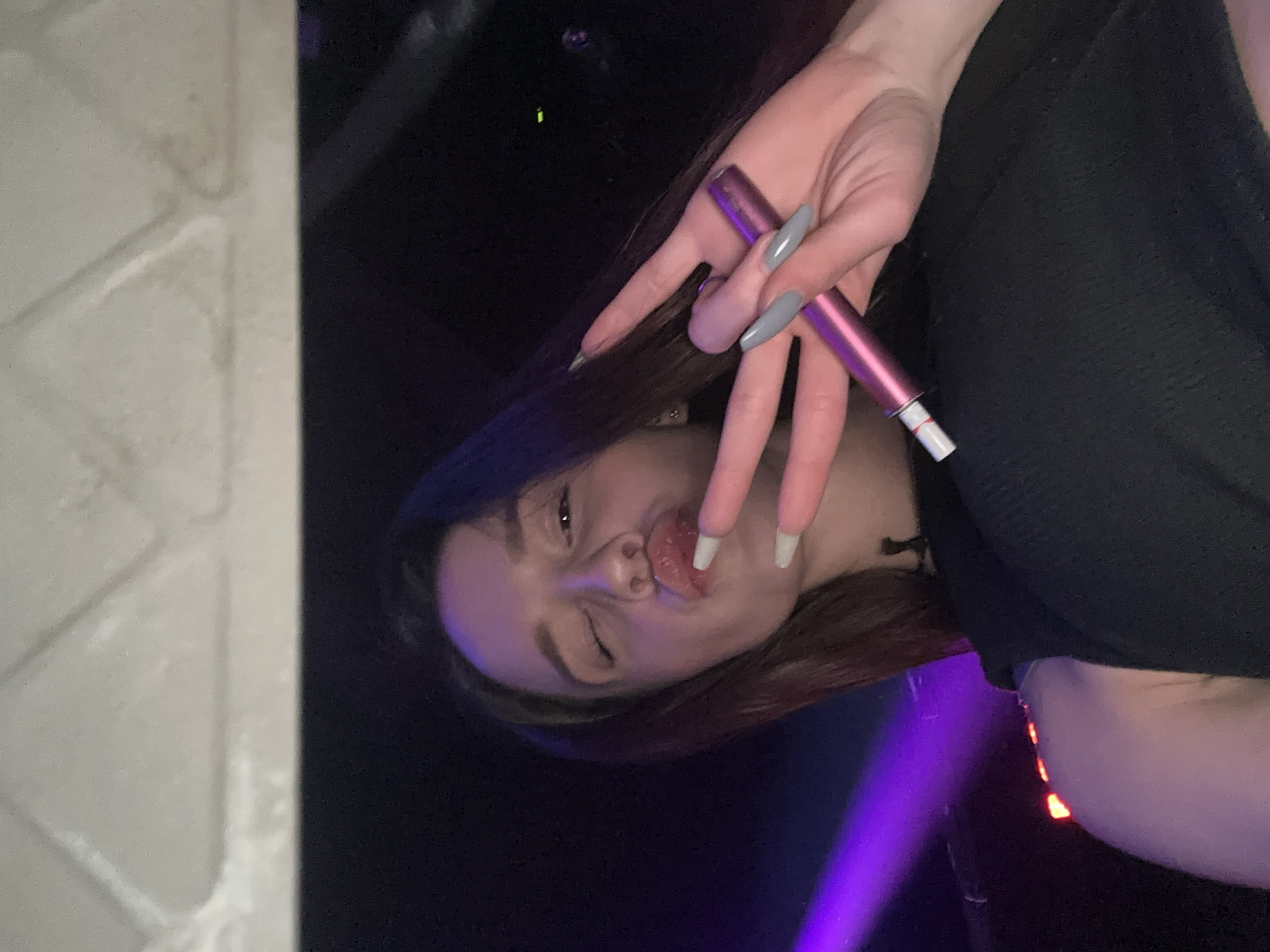 Nightclub patrons socialize and party in Varna, Bulgaria venue