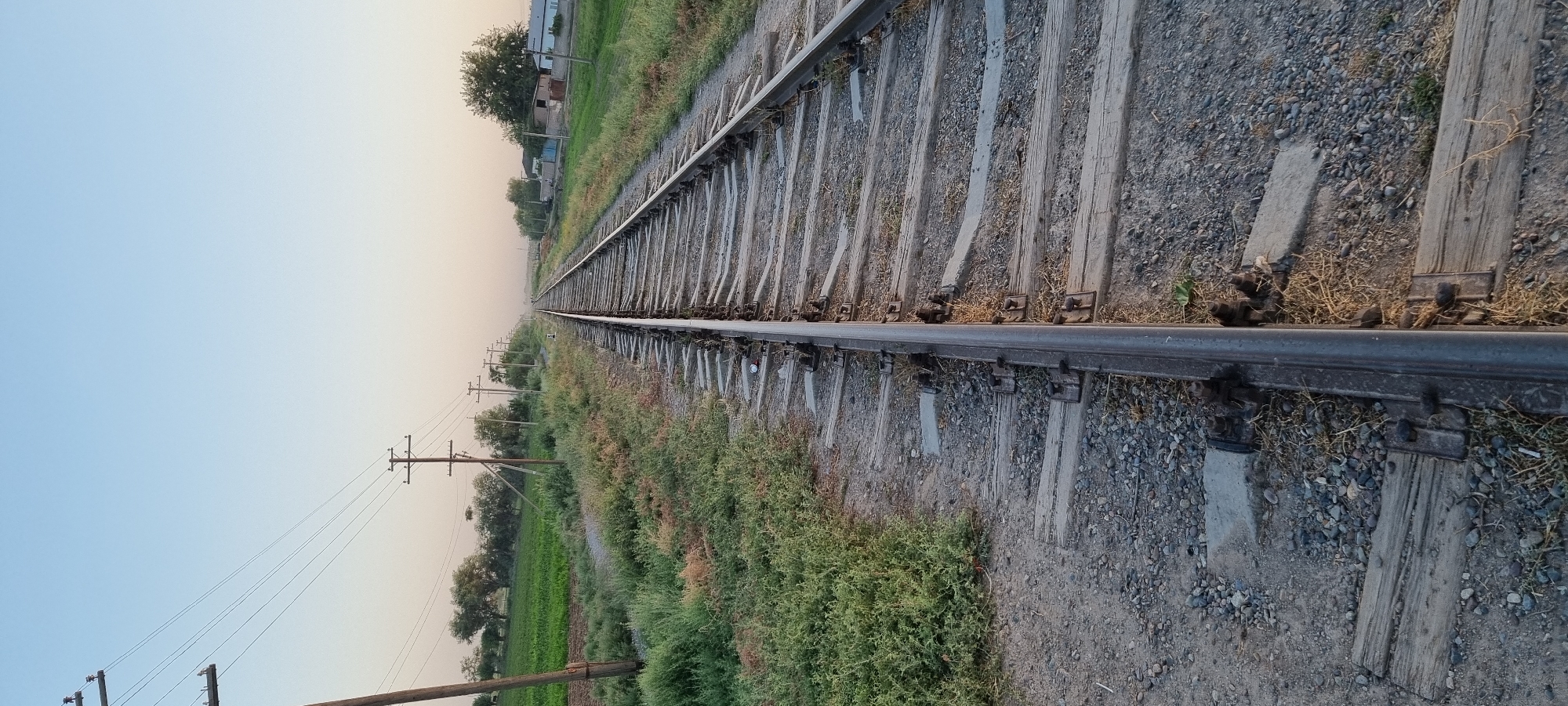 Railway tracks and rural roads through southern Tajikistan
