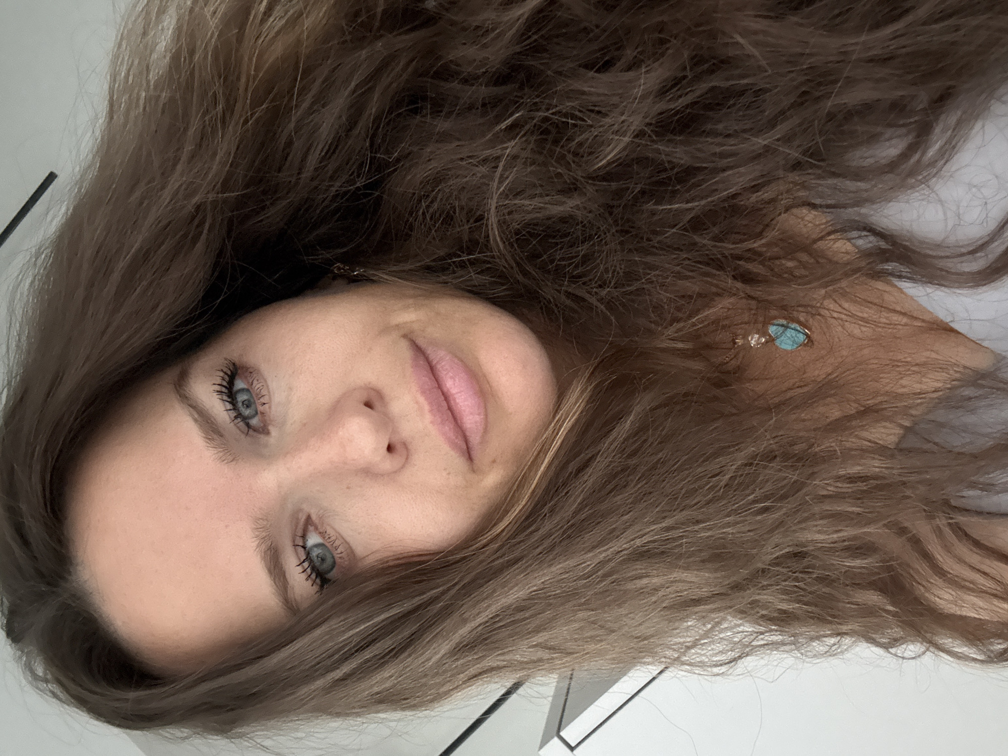 Casual selfie session, close-up to full sitting pose