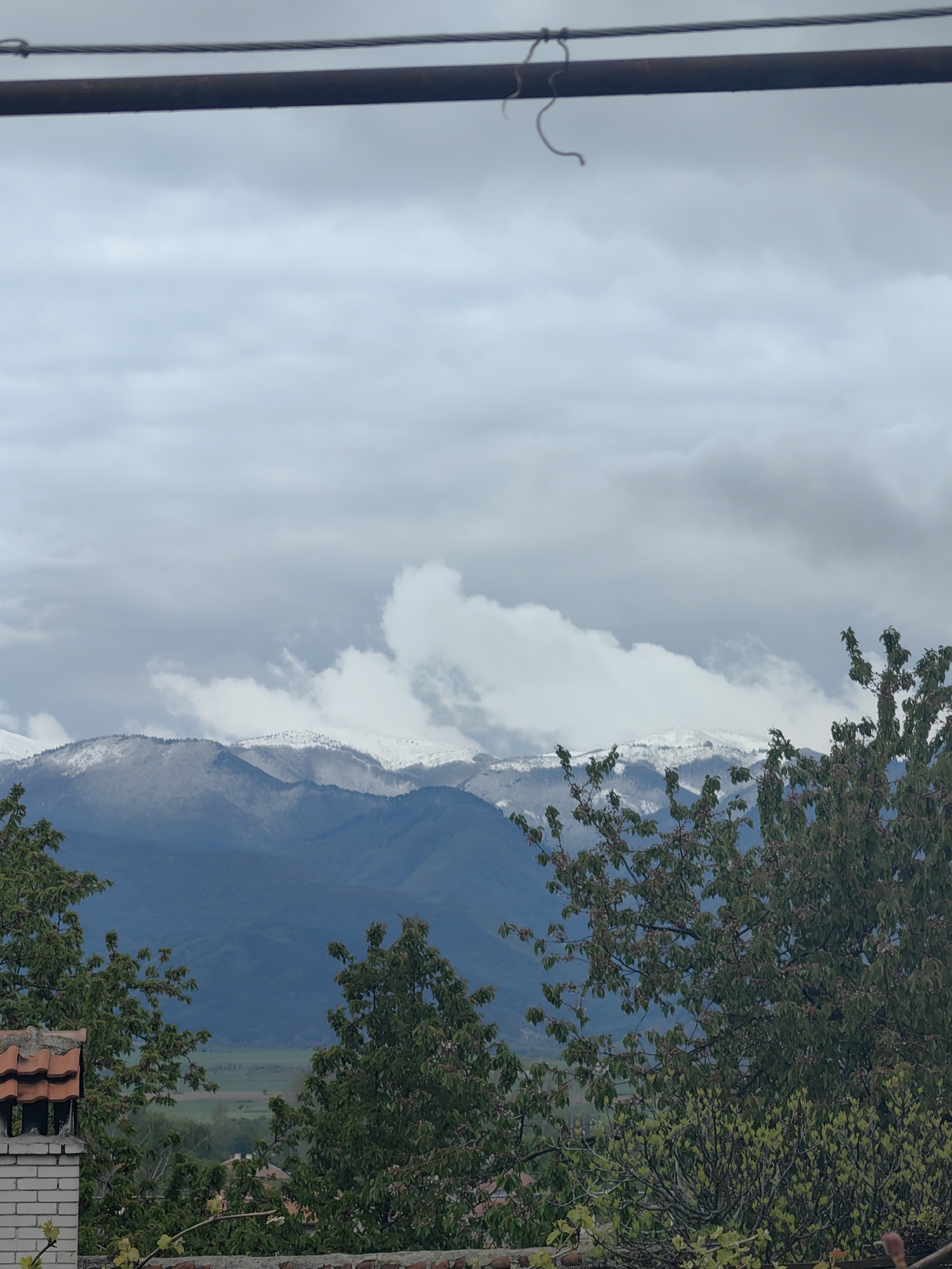 Overcast mountain vista observed in Slatina, Bulgaria