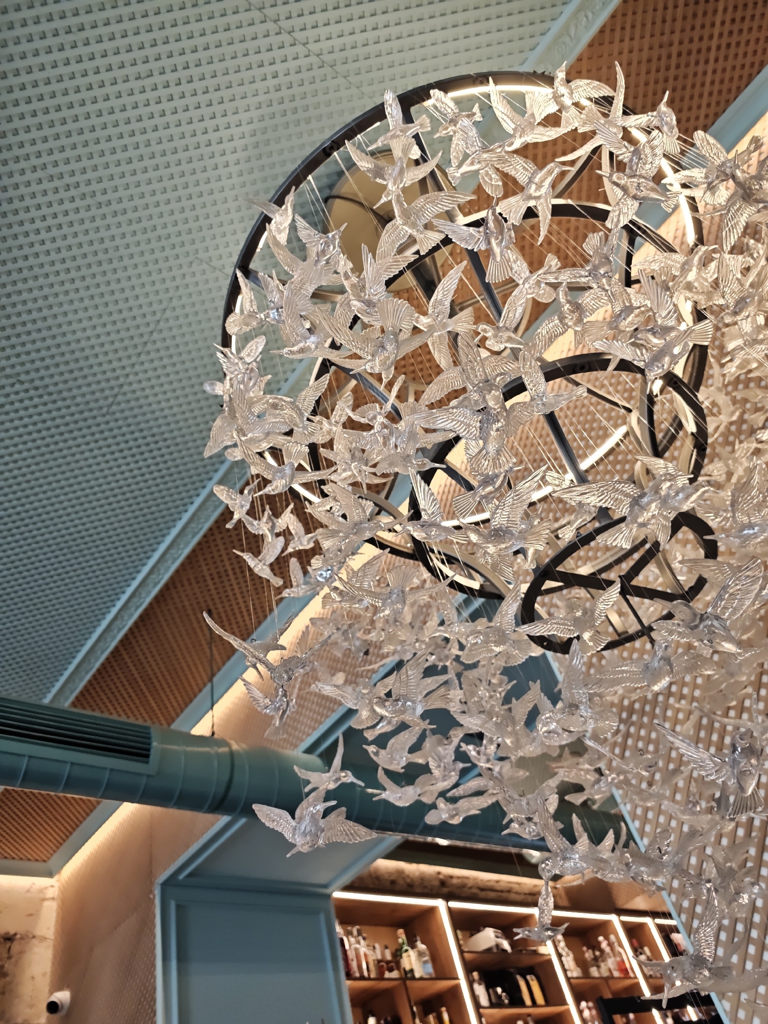 Morning drinks photographed at Kyiv bar with artistic chandelier