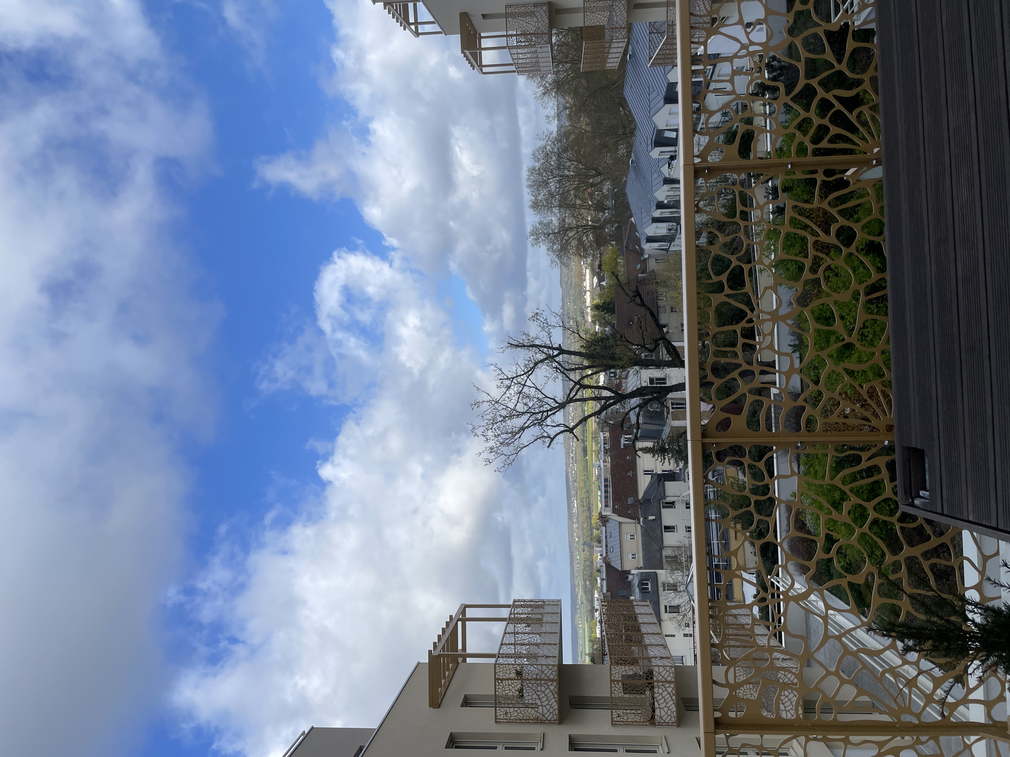 Morning balcony view captured in Saint-Cyr-l'École, France