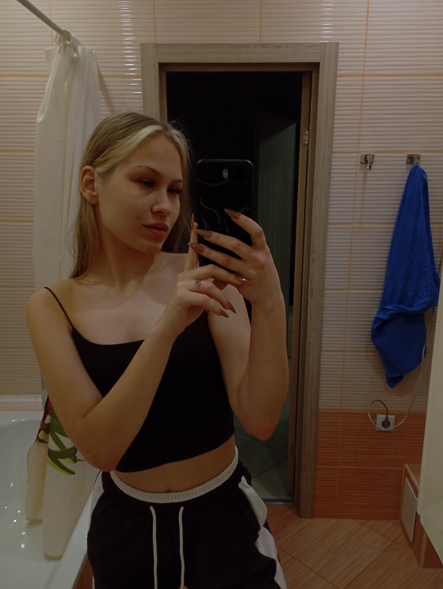 Young woman takes bathroom selfies in Krasnodar residence