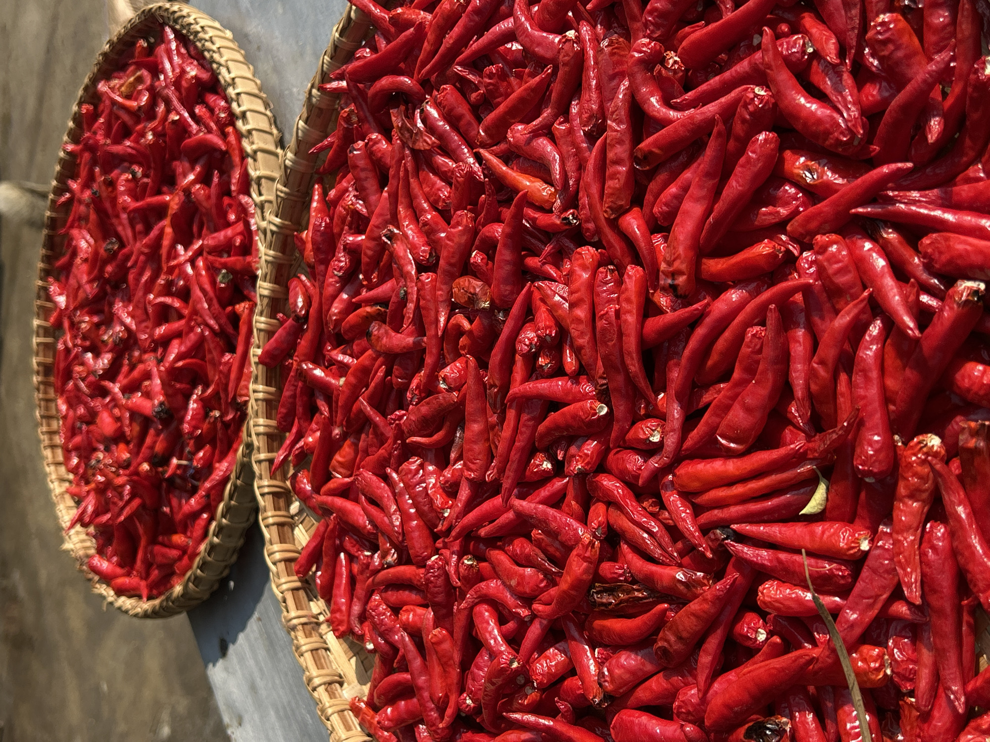 Street vendors display peppers, hats in decorated Nha Trang