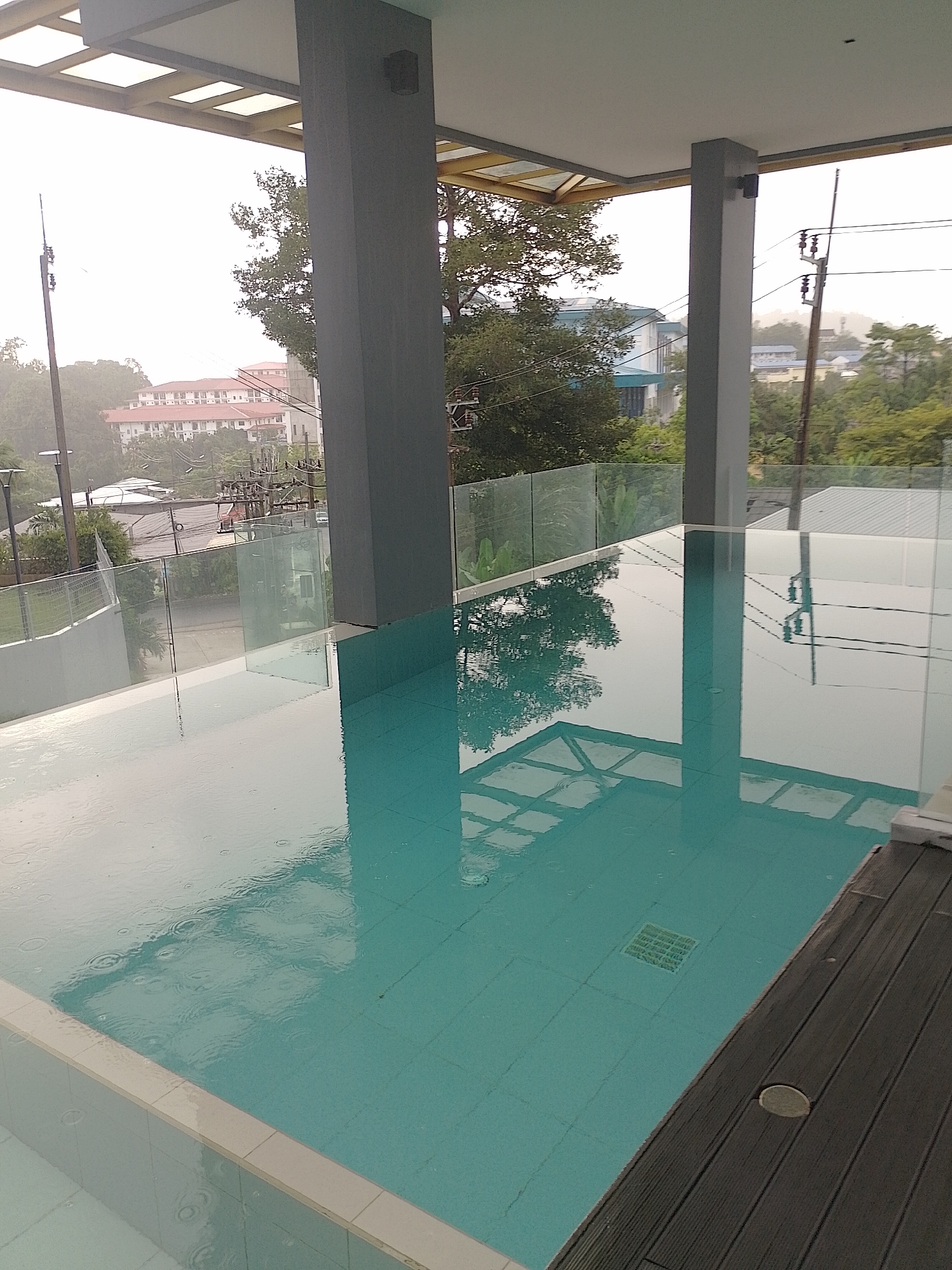 Rainy evening around Phuket's pools and wet streets