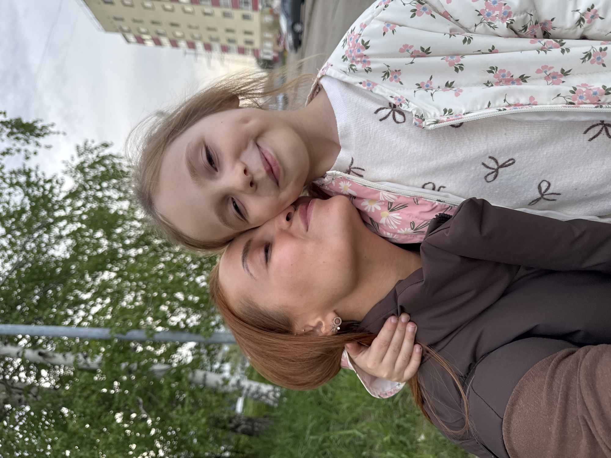 Woman and girl walk corgi, take selfies in Chaikovsky