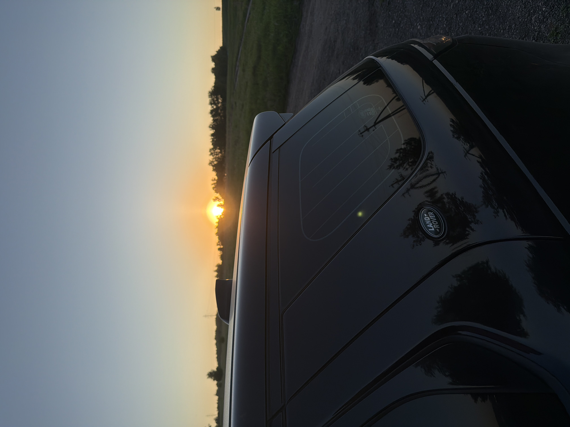 Land Rover photographed multiple times in rural Krasnoyarsk settings