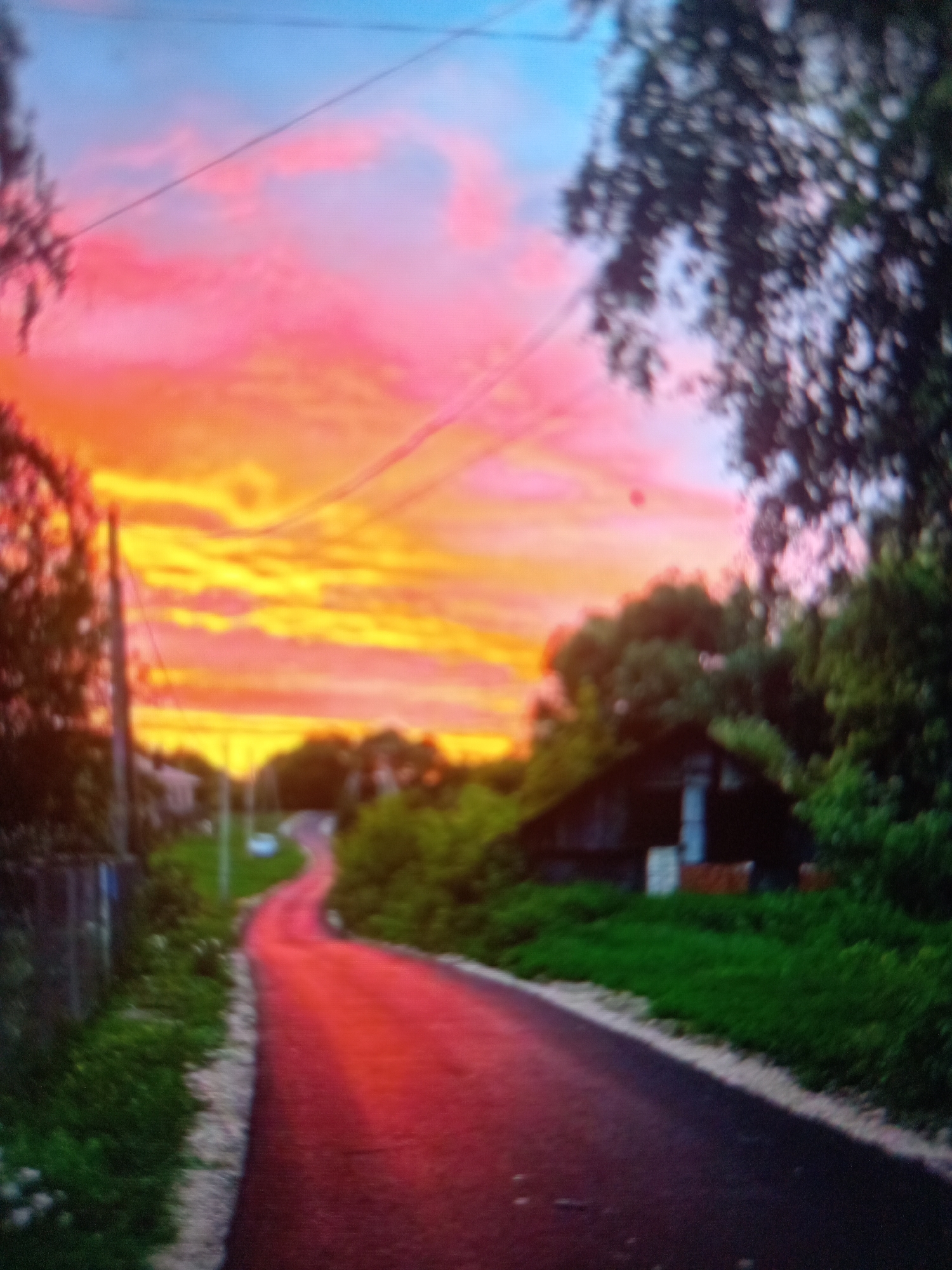 Sunset scenes across water, fields, and open roads