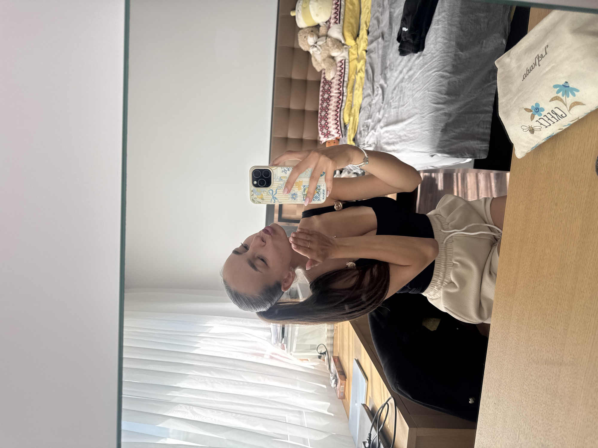 Mirror selfies from a Sofia apartment, midday July 2026