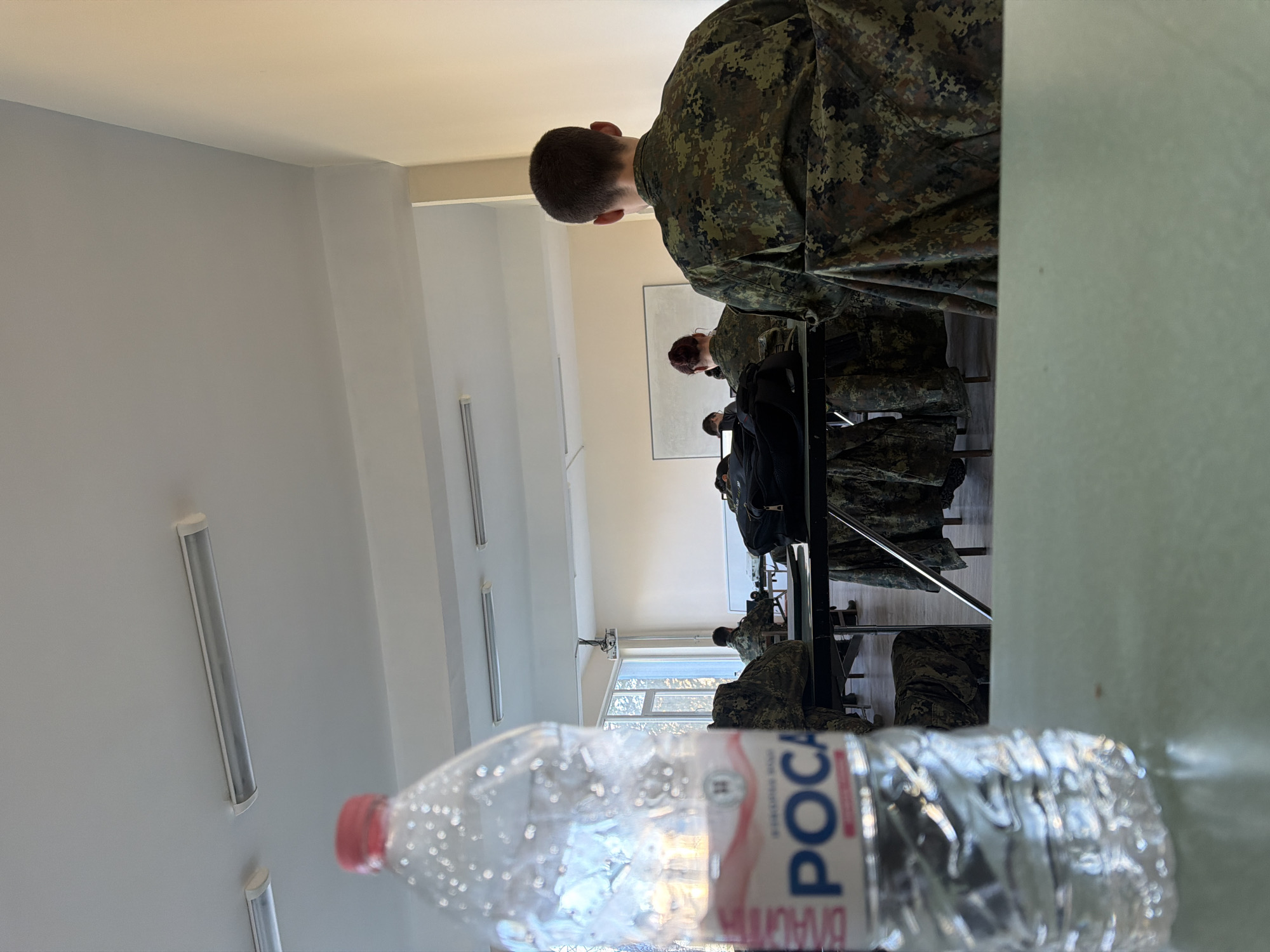 Military personnel gather in classroom setting in Bulgarian town